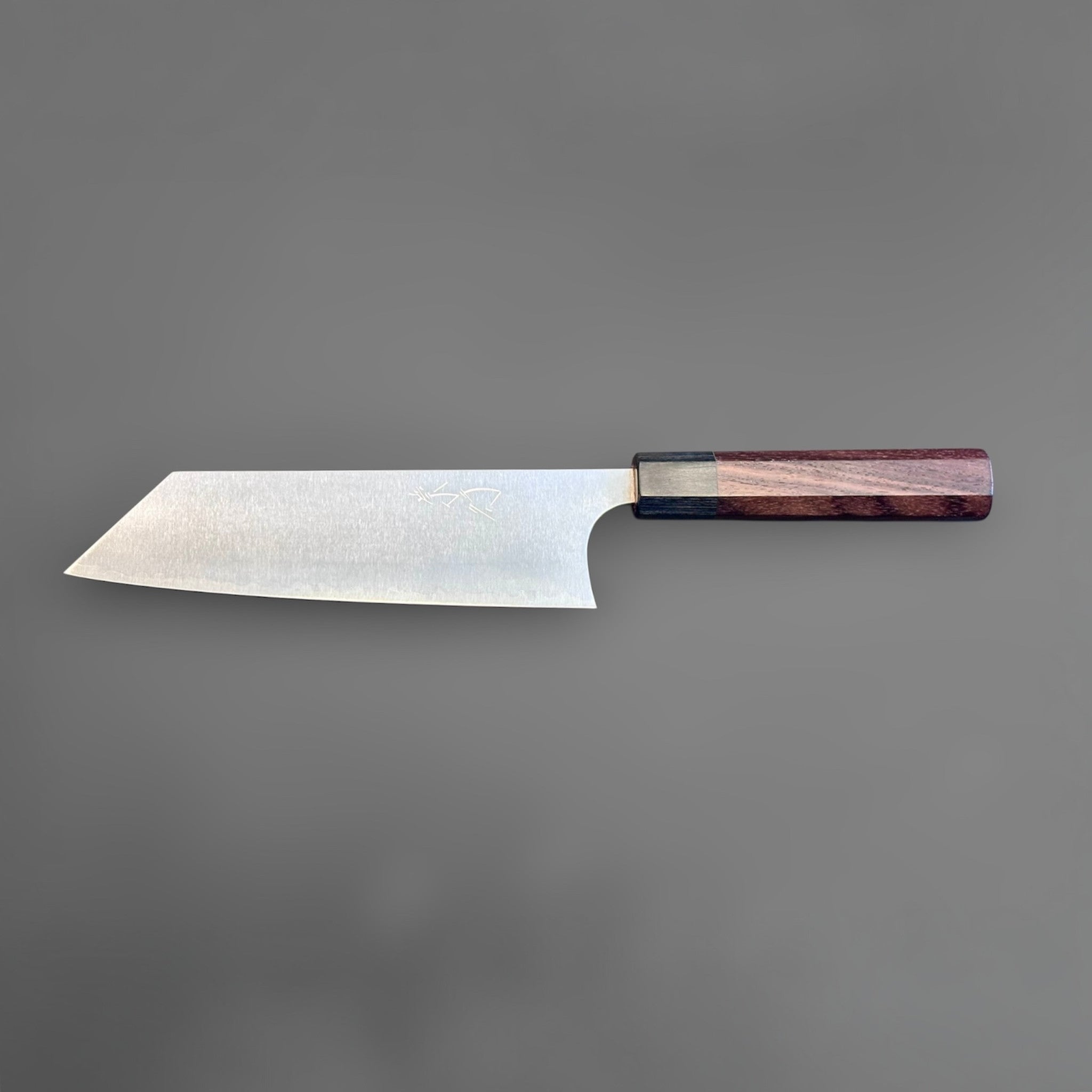 Koutetsu SG2 Bunka 180 mm with rosewood octagonal handle, full profile with logo side visible and balanced wa handle proportions.