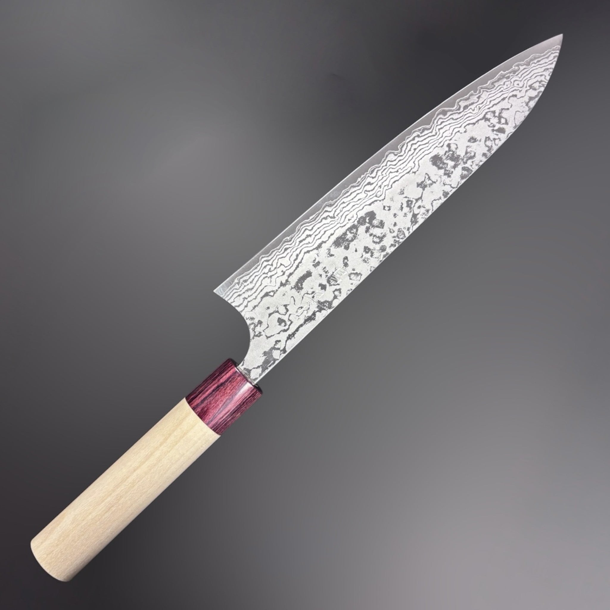 Masakage Kiri Damascus Gyuto 210 mm, alternate angle highlighting blade curvature and wa handle.