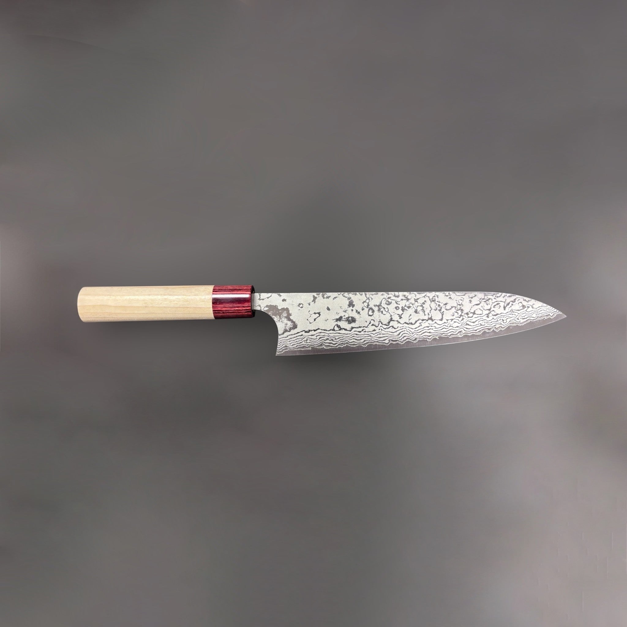 Masakage Kiri Damascus Gyuto 210 mm, full knife profile on neutral grey background.