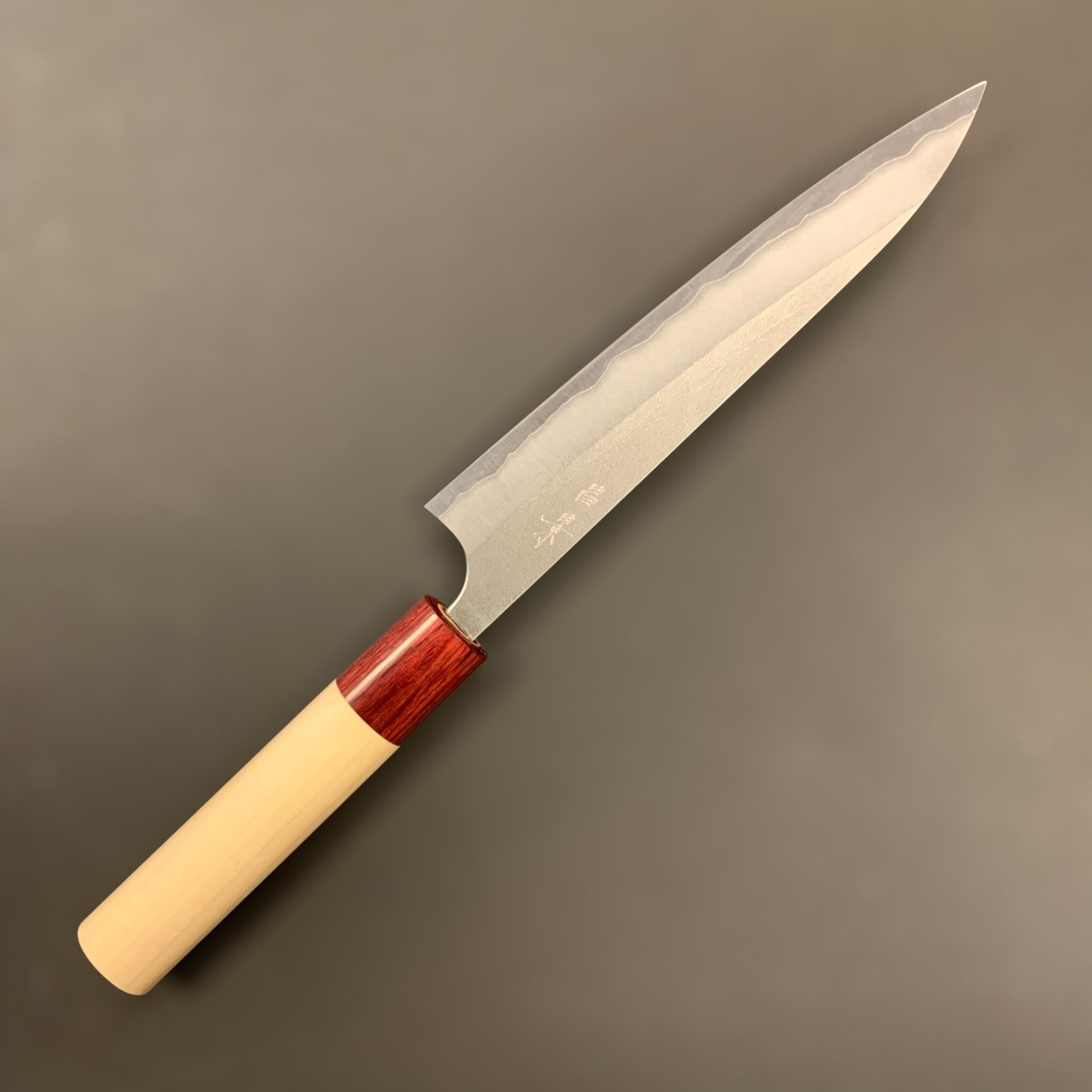 Masakage Yuki Petty 150mm, close-up of the thin blade profile and frosted Nashiji finish.