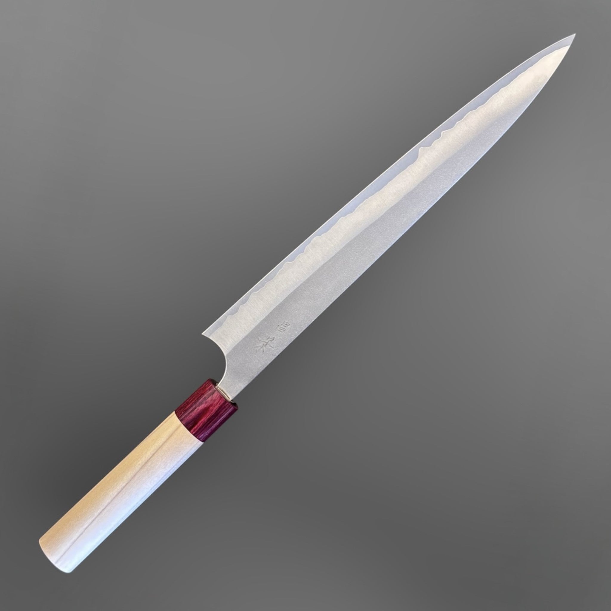 Masakage Yuki Sujihiki 270 mm, opposite-side angled view showing blade finish, kanji, and wa handle.