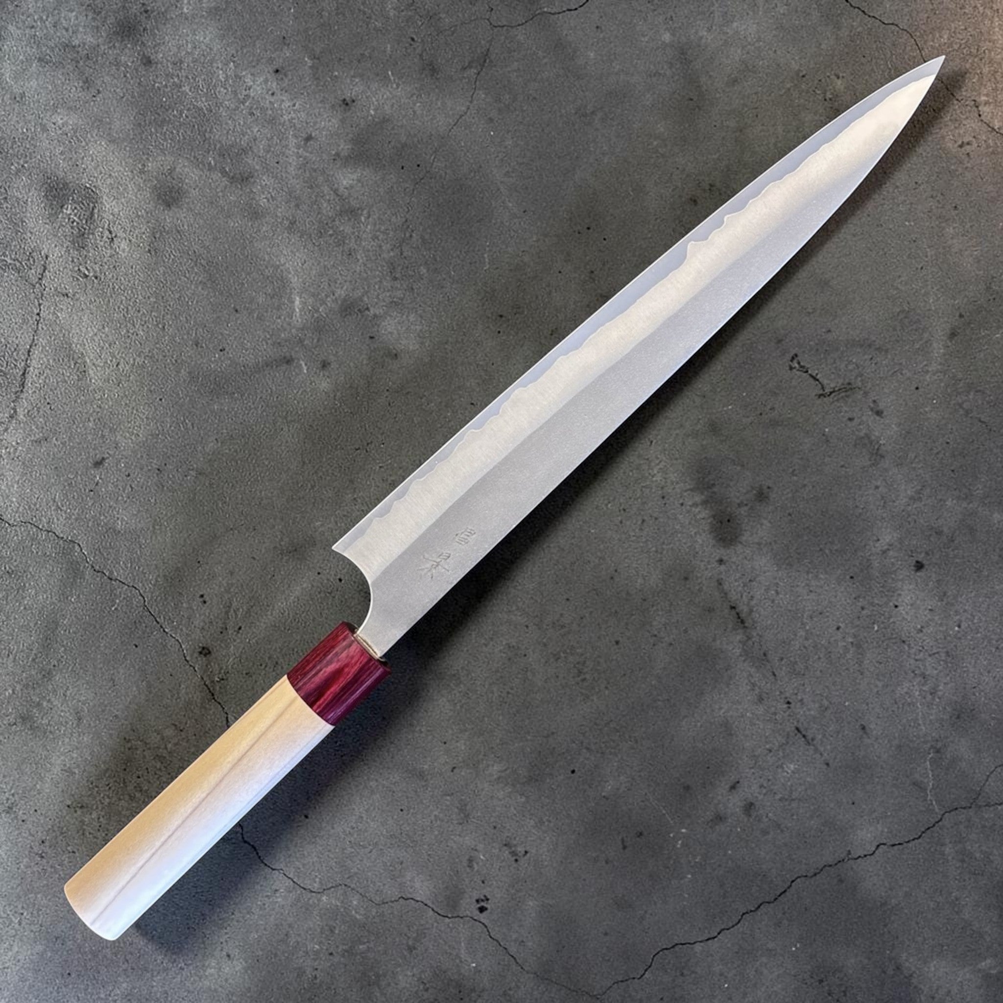 Masakage Yuki Sujihiki 270 mm, opposite-side angled view showing blade finish, kanji, and wa handle.
