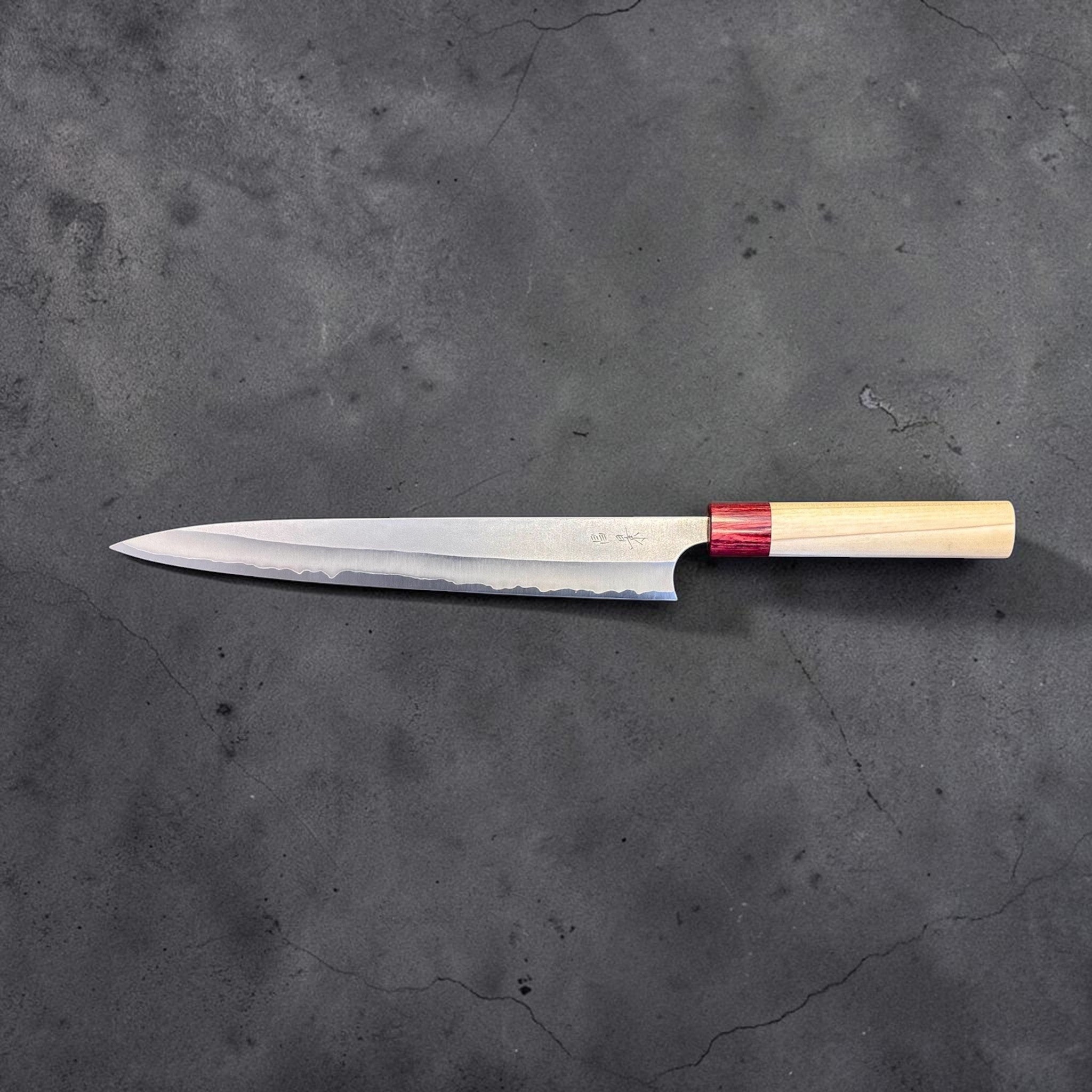 Masakage Yuki Sujihiki 270 mm, full side profile showing the long slicing blade and pale wood handle.