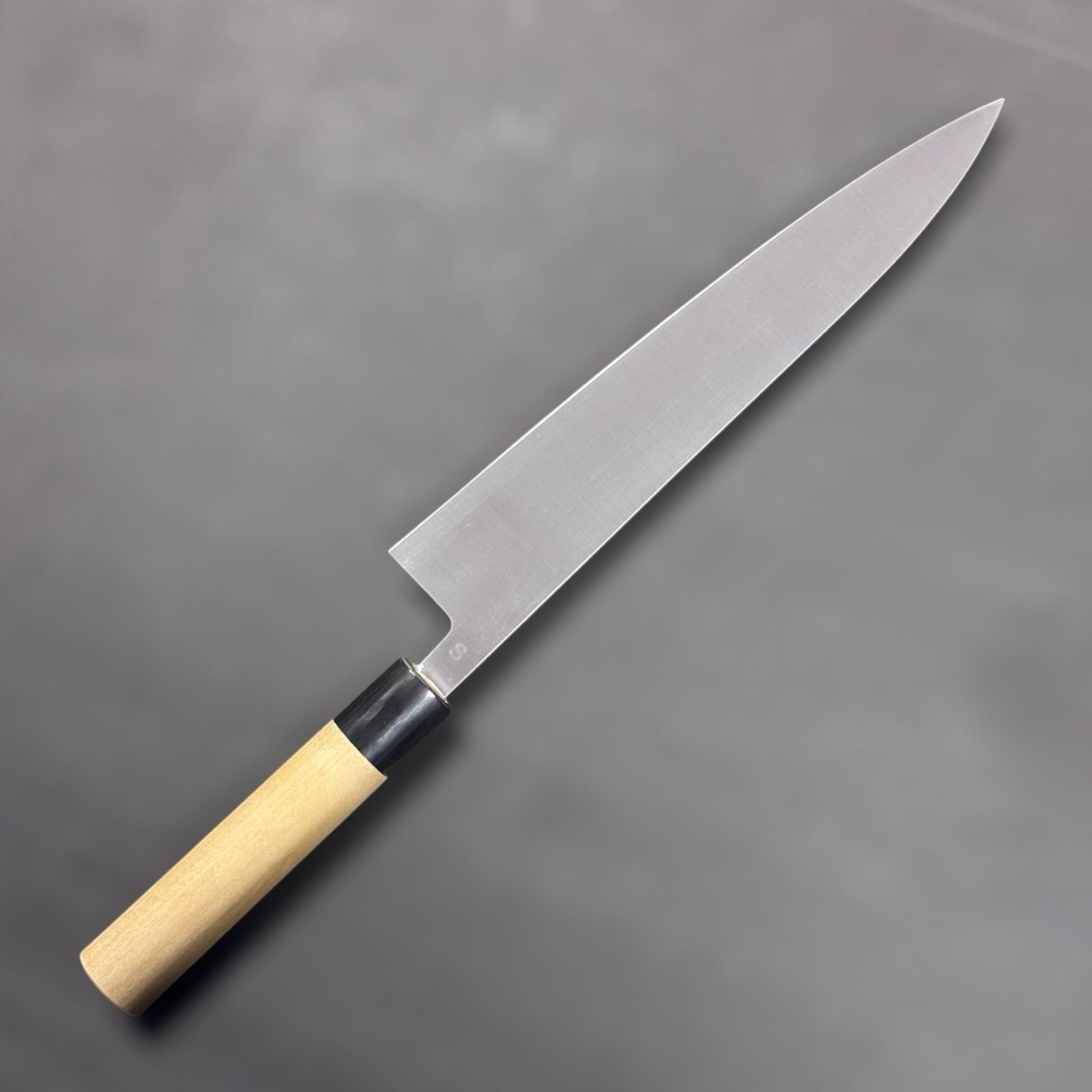 Masamoto SW Swedish Steel Gyuto 240 mm, left face with kanji and blonde wa handle.