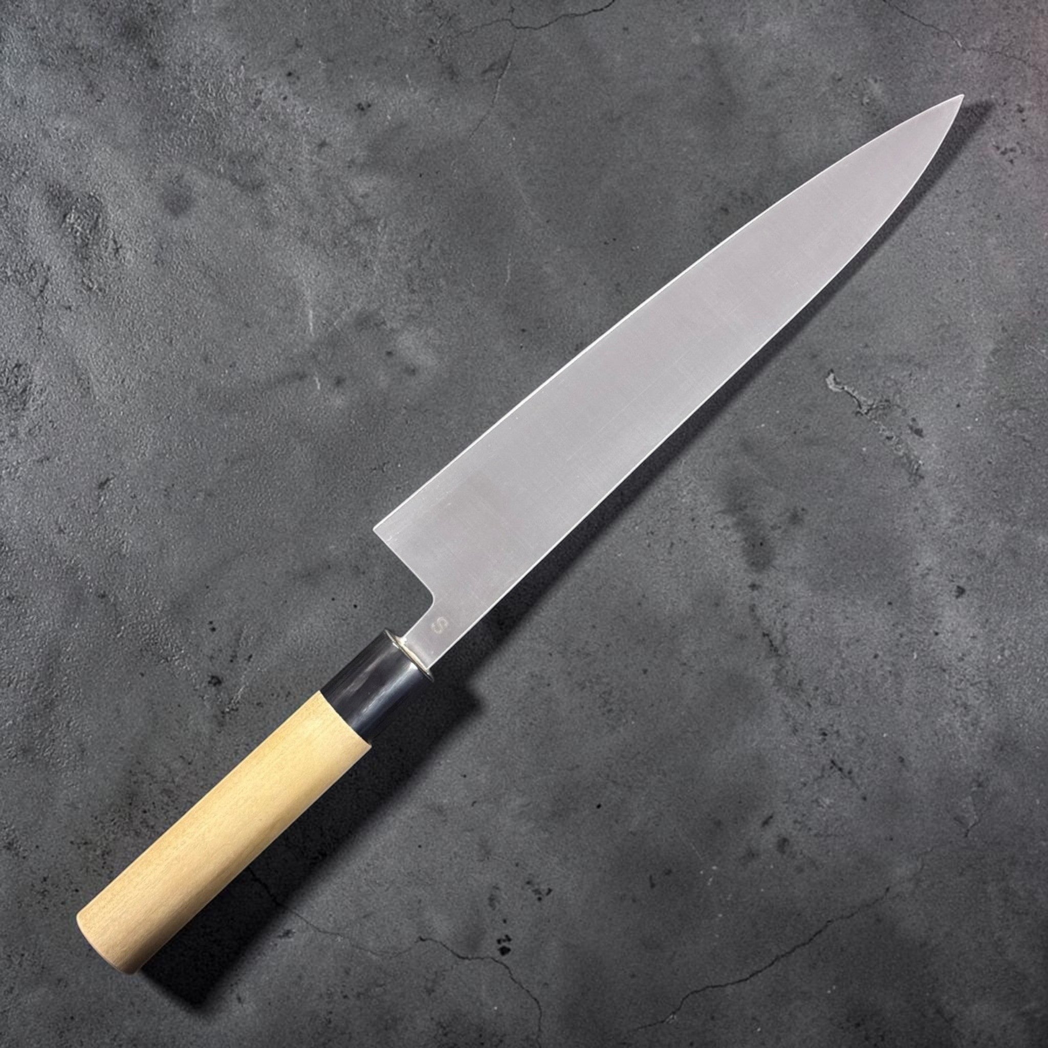 Masamoto SW Swedish Steel Gyuto 240 mm, left face with kanji and blonde wa handle.