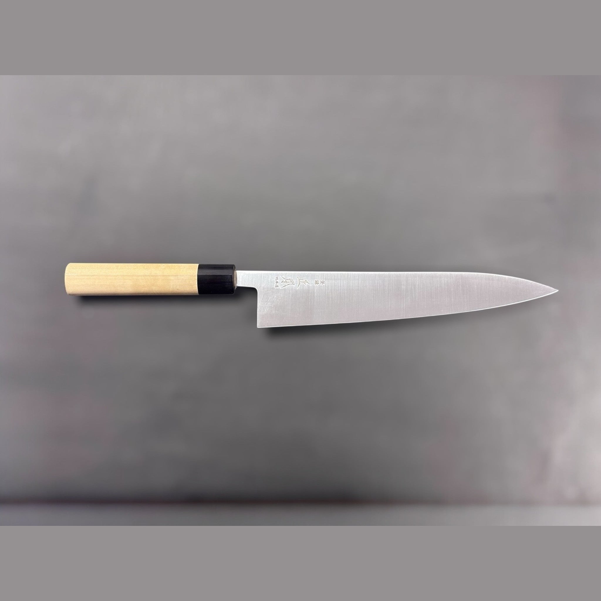 Masamoto SW Swedish Steel Gyuto 240 mm, full profile on neutral background.