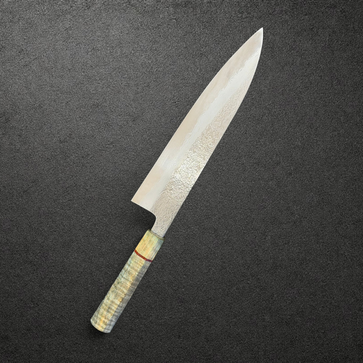 Masuda Blue 1 Migaki Damascus Gyuto 240mm with Prisma handle, angled reverse-side view