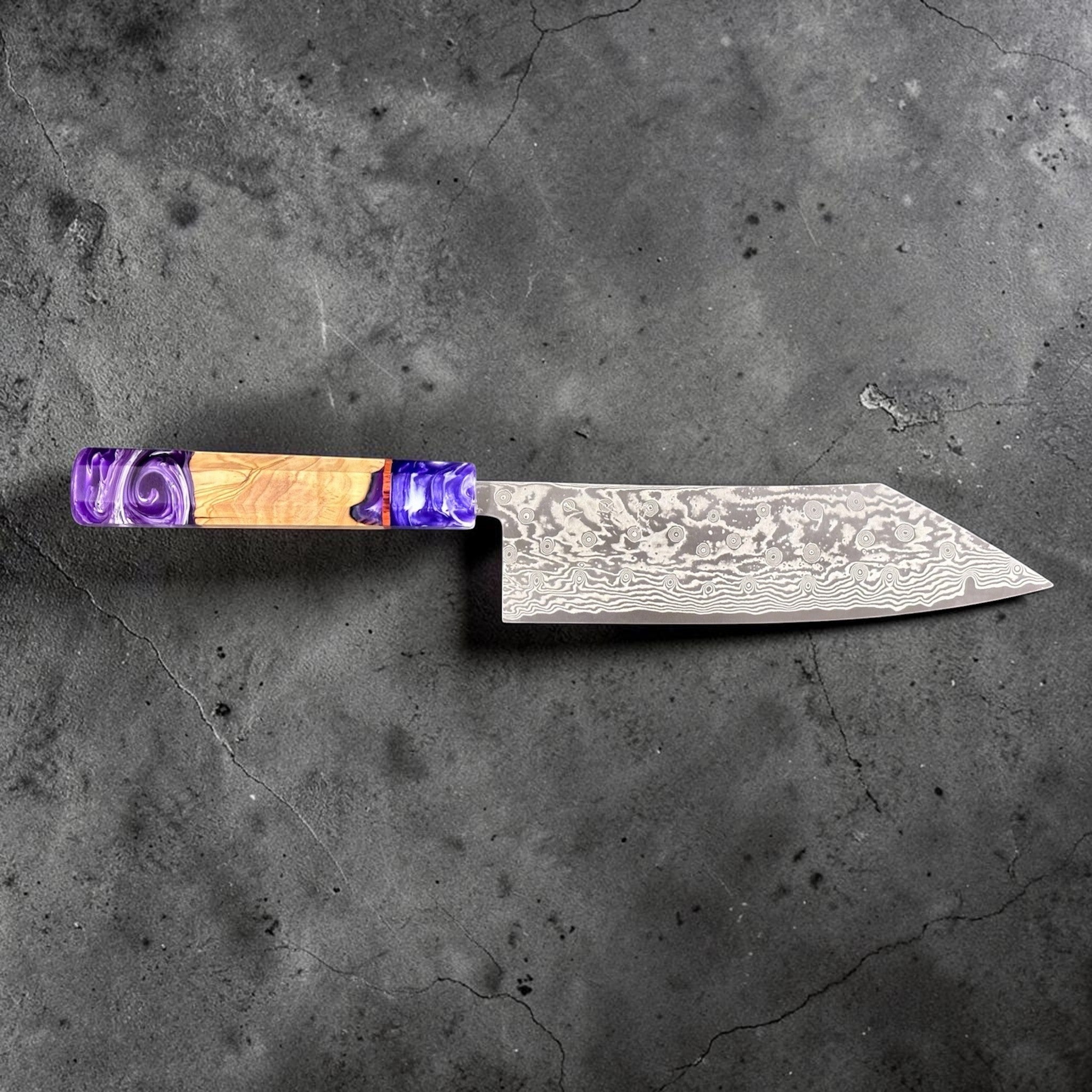 Miyazaki Kajiya ATS-34 Damascus Tsubaki 220 mm with Prisma knife handle, side profile showing the long patterned blade and sculpted purple-and-wood handle.