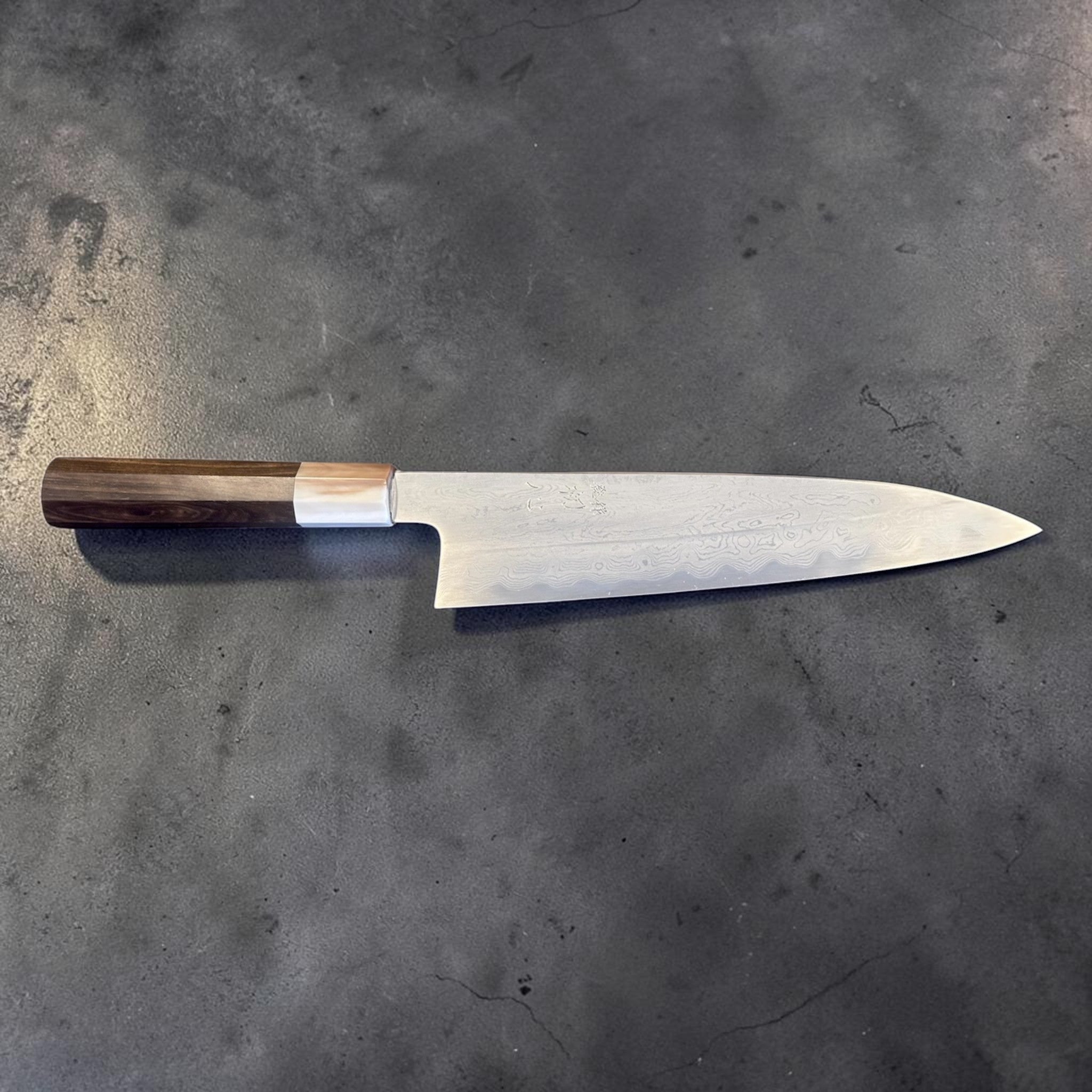 Nakagawa Satoshi Blue #1 Damascus Gyuto 225 mm with ebony and horn handle, side profile showing full blade and handle.