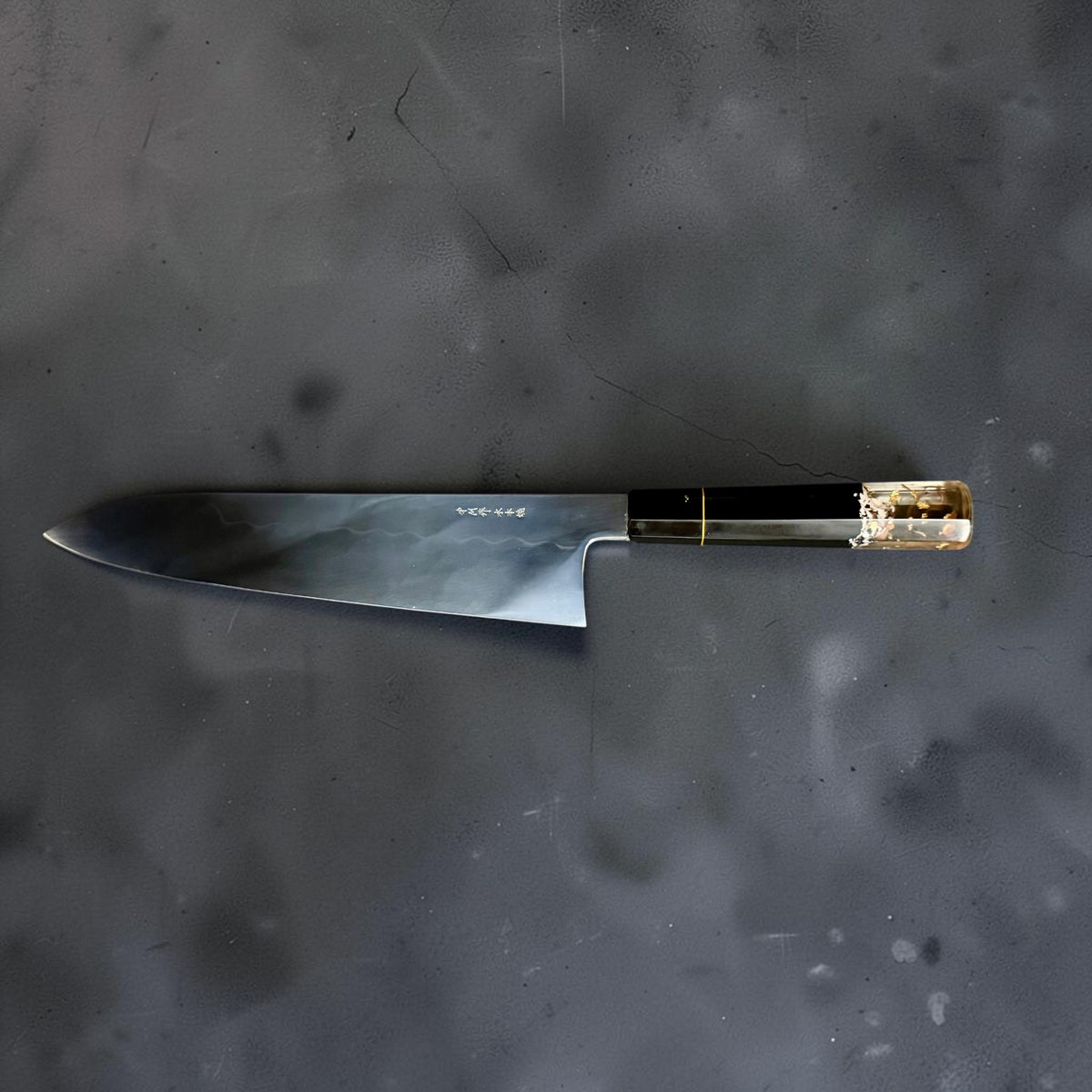 Inscribed blade profile of Nakagawa White #2 honyaki 255mm gyuto with visible hamon and Prisma wa handle