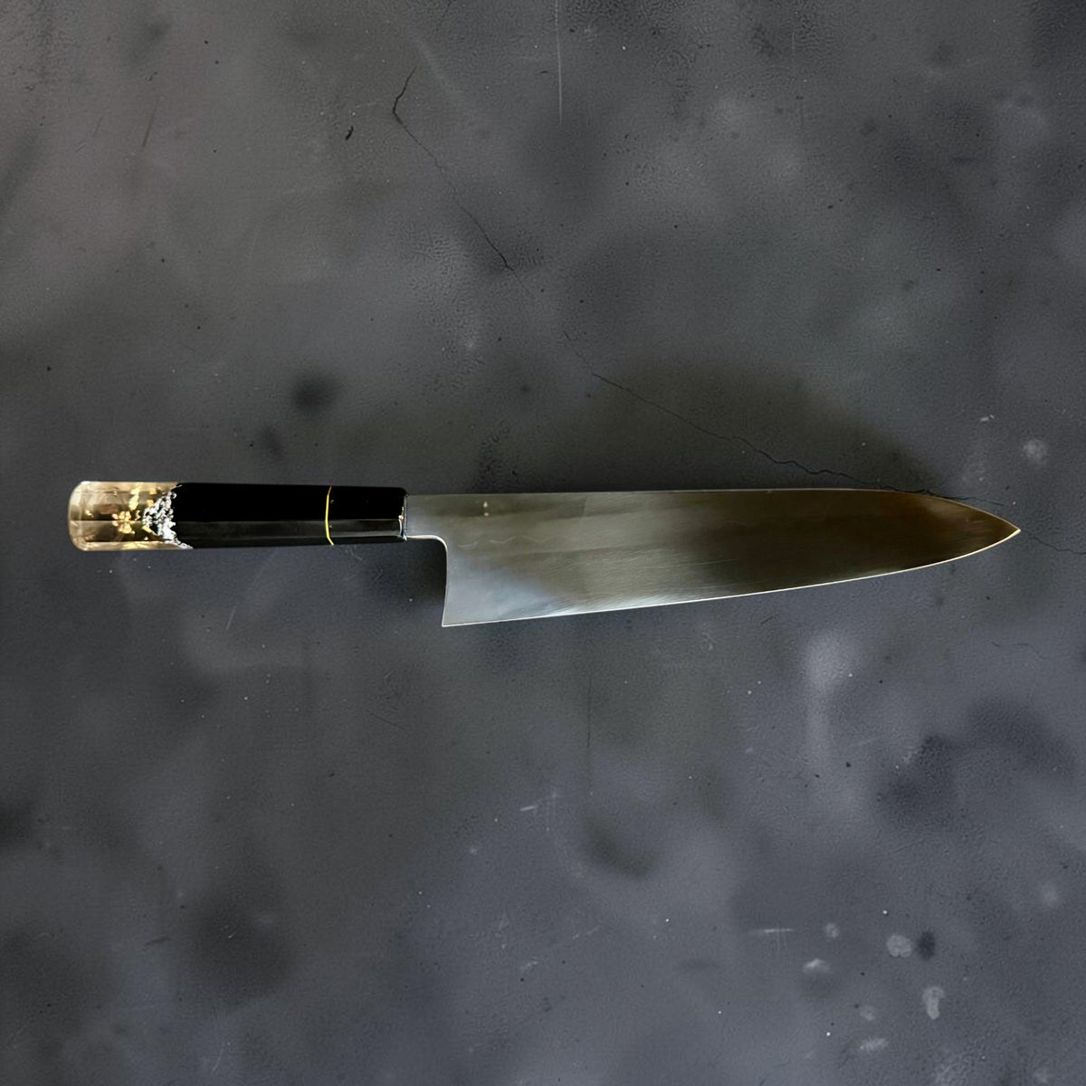 Full reverse profile of the tall Nakagawa × Tokushu honyaki gyuto with black and clear Prisma handle