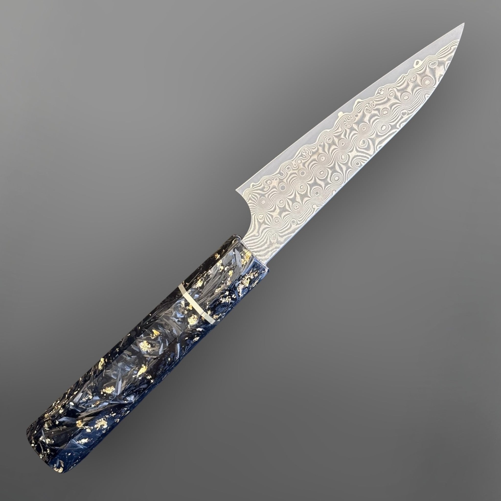Nigara Anmon SG2 Petty 120 mm with carbon fiber and gold fleck handle, alternate angled view highlighting the blade pattern.