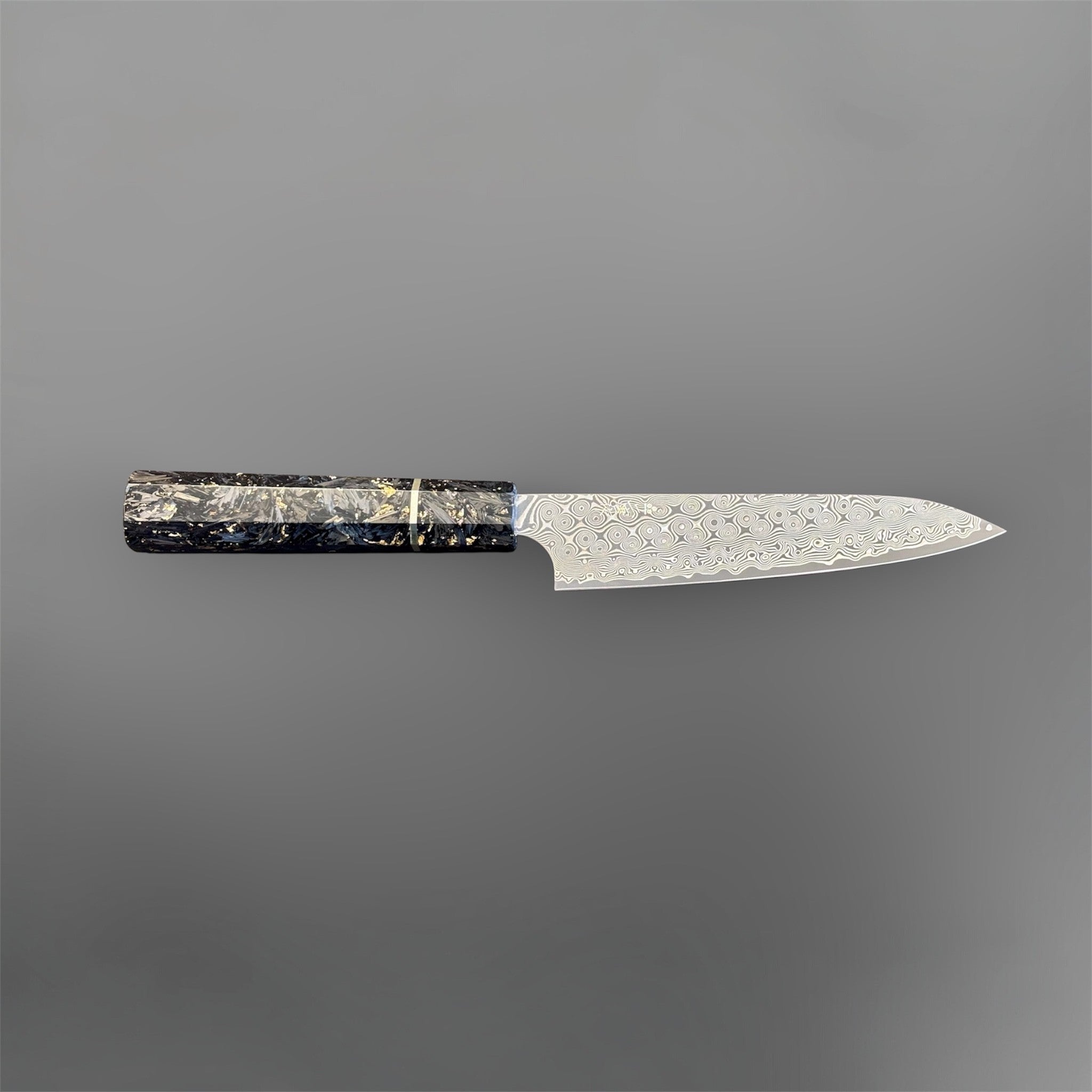 Nigara Anmon SG2 Petty 150 mm with carbon fiber and gold fleck handle, full horizontal profile view.