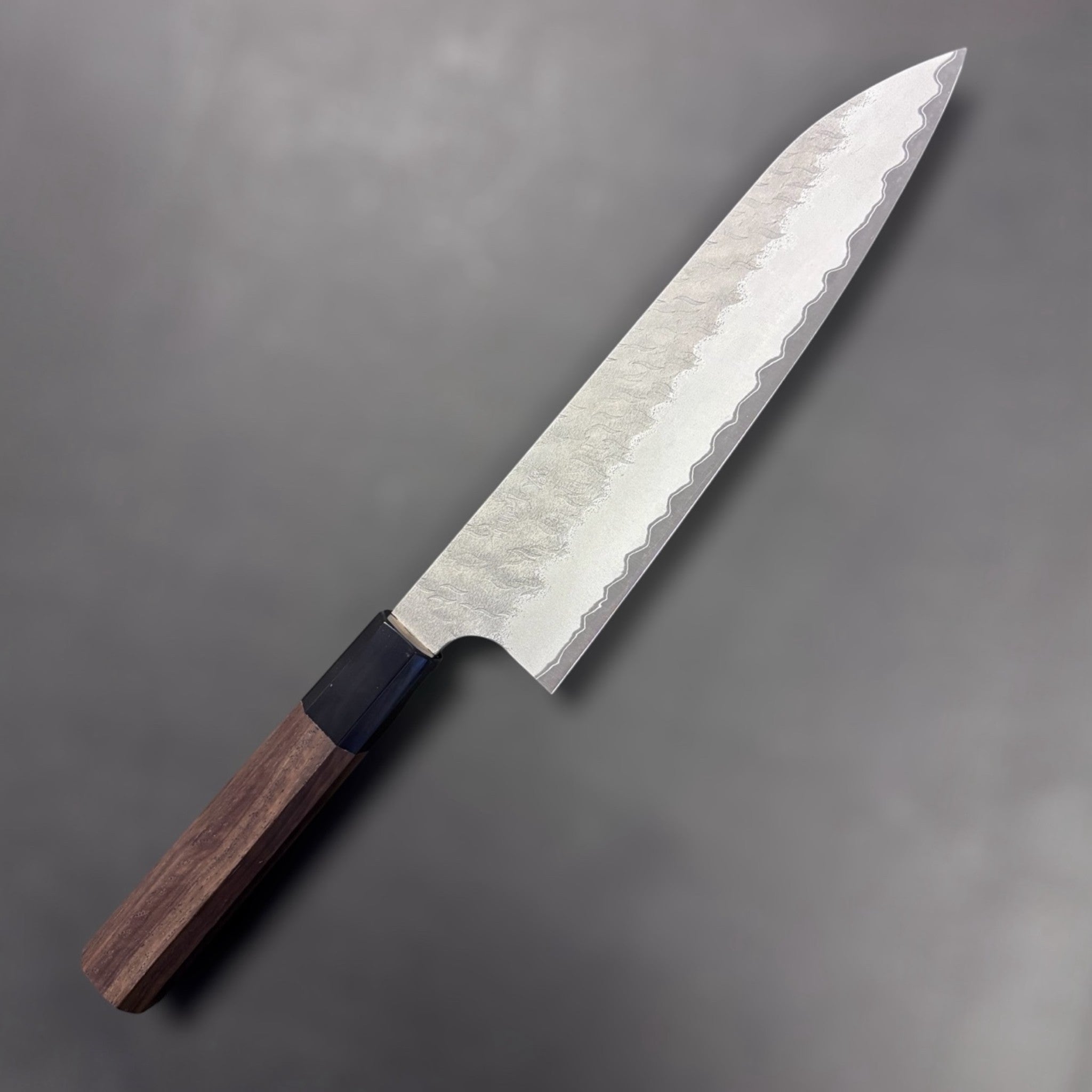 Nigara Aogami Super Gyuto 210mm on a grey background Right side of knife. 