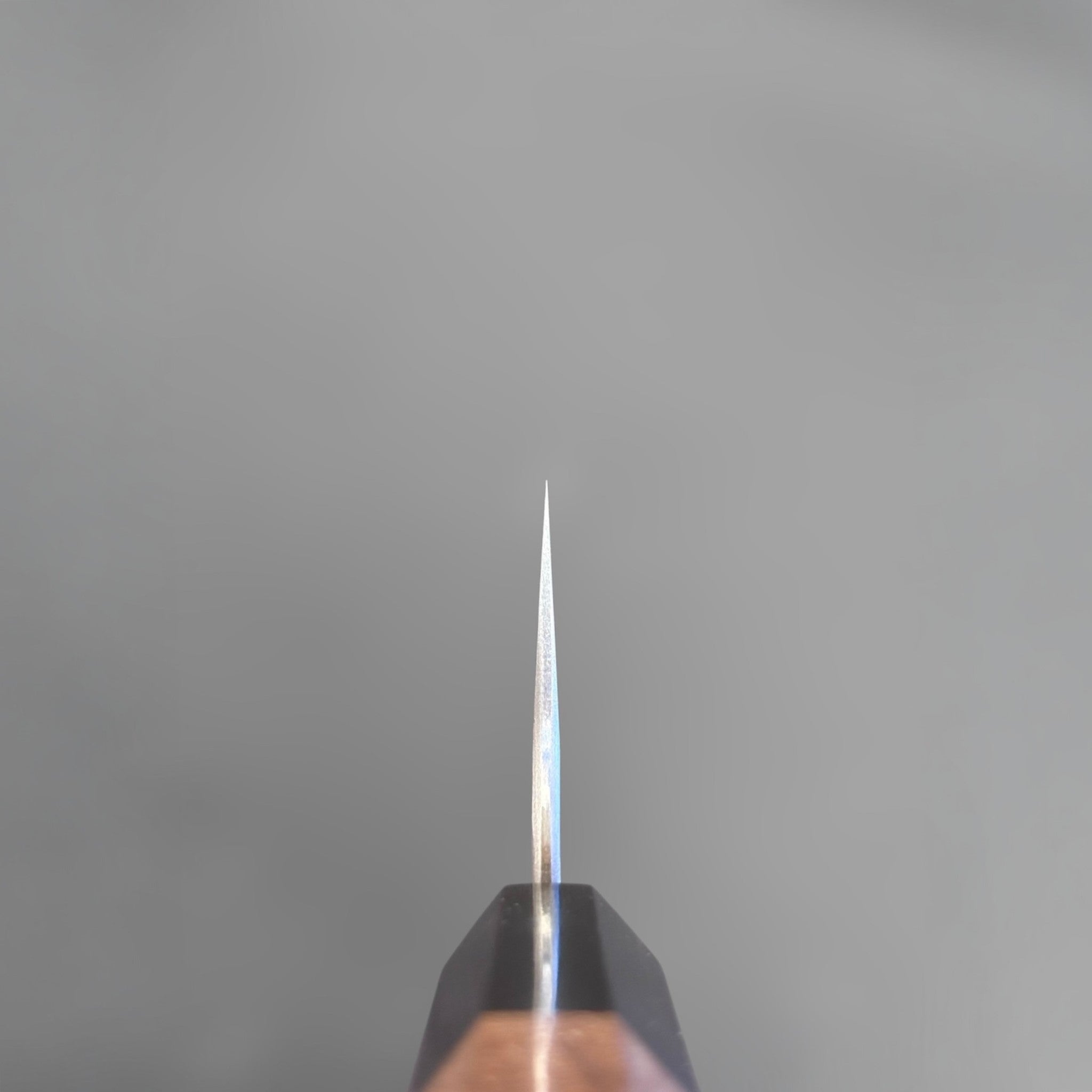 Nigara Aogami Super Steel Tsuchime Bunka 180 mm with walnut and horn handle, choil shot showing fine tip and blade thickness.