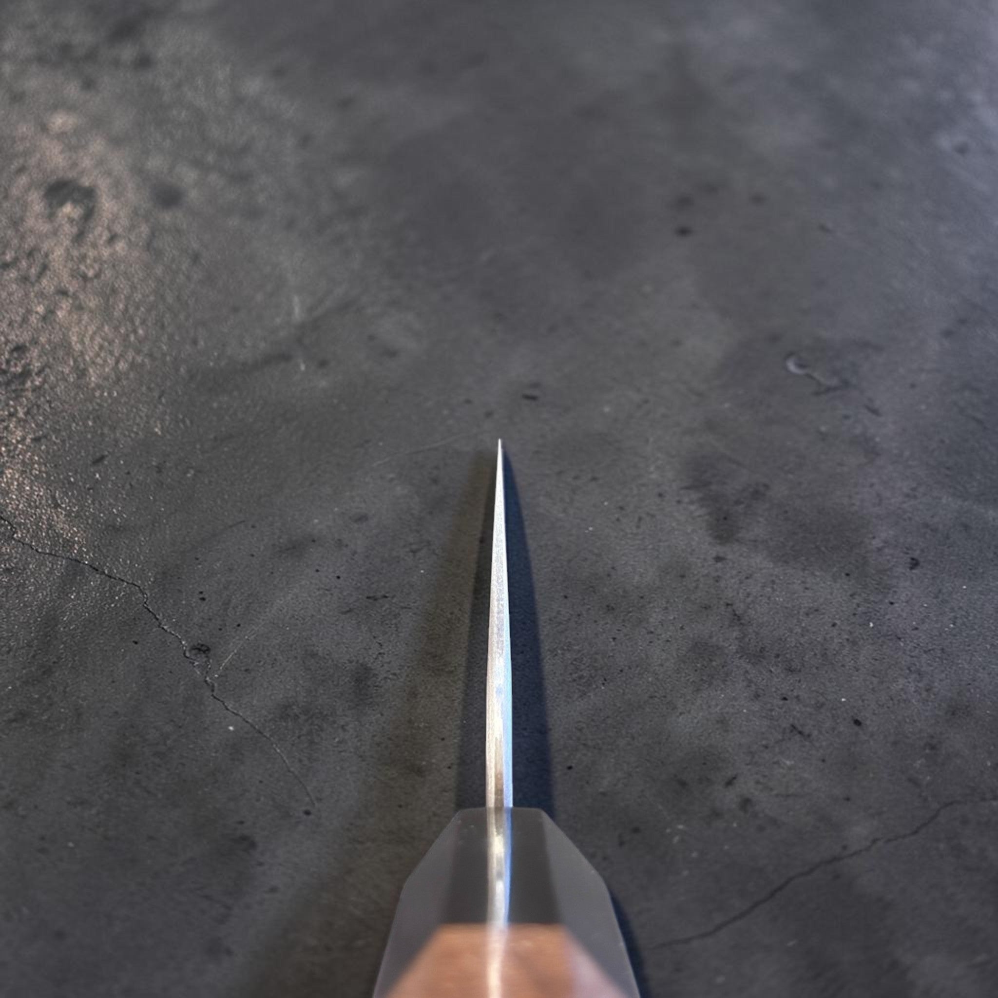 Nigara Aogami Super Steel Tsuchime Bunka 180 mm with walnut and horn handle, choil shot showing fine tip and blade thickness.