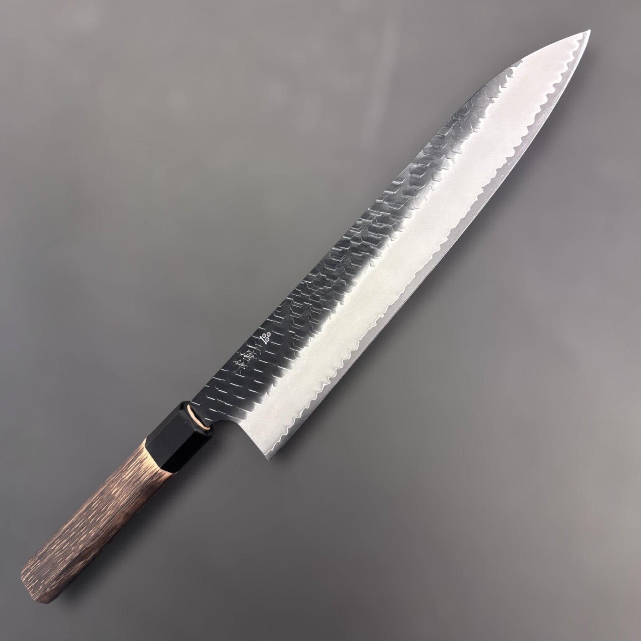 Nigara Hamono SG2 Kurouchi Tsuchime Gyuto 270 mm, reverse side with maker's kanji visible on the blade.