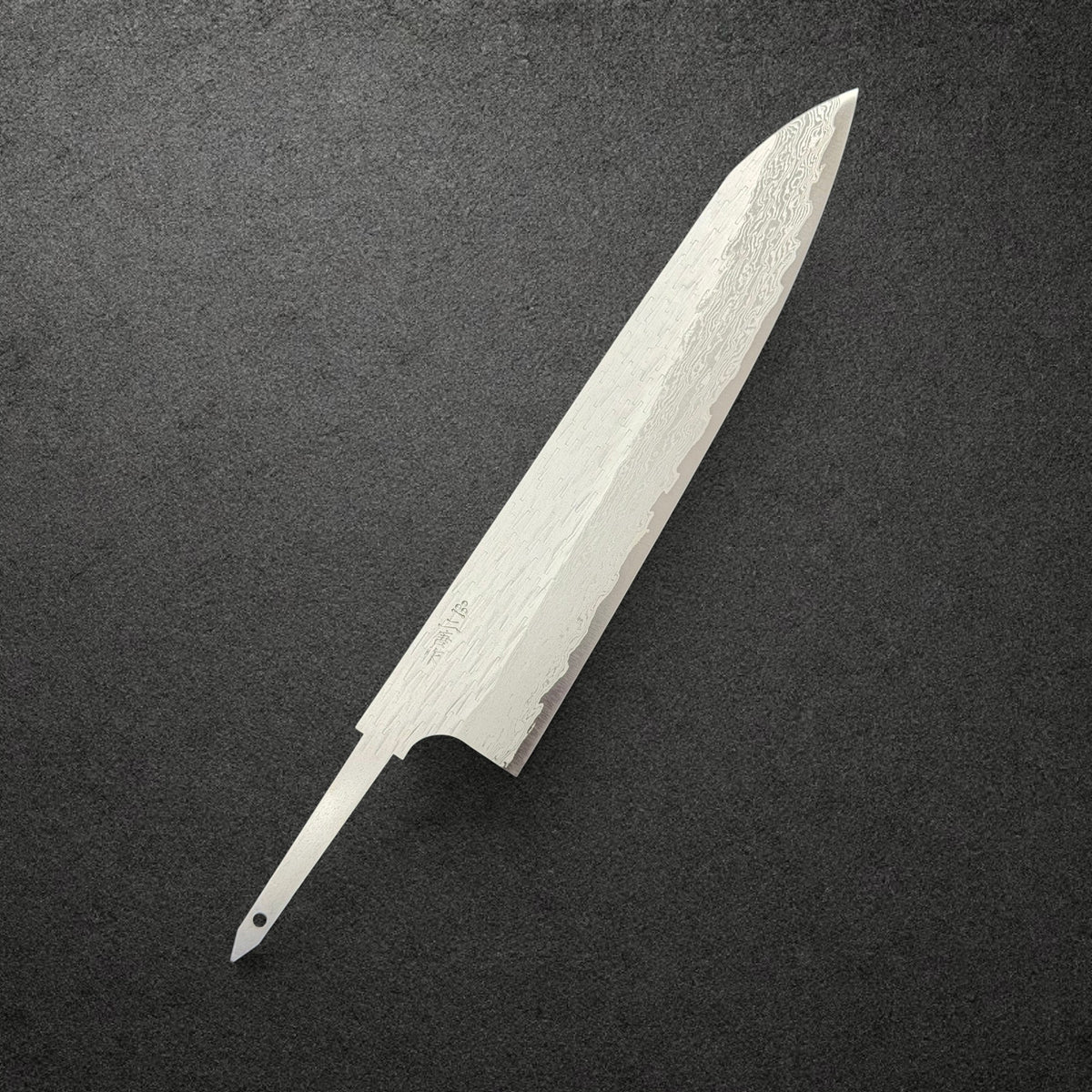 Nigara VG-XEOS Tsuchime Gyuto 240mm blade only, front angled view showing Damascus cladding, kanji and exposed tang.
