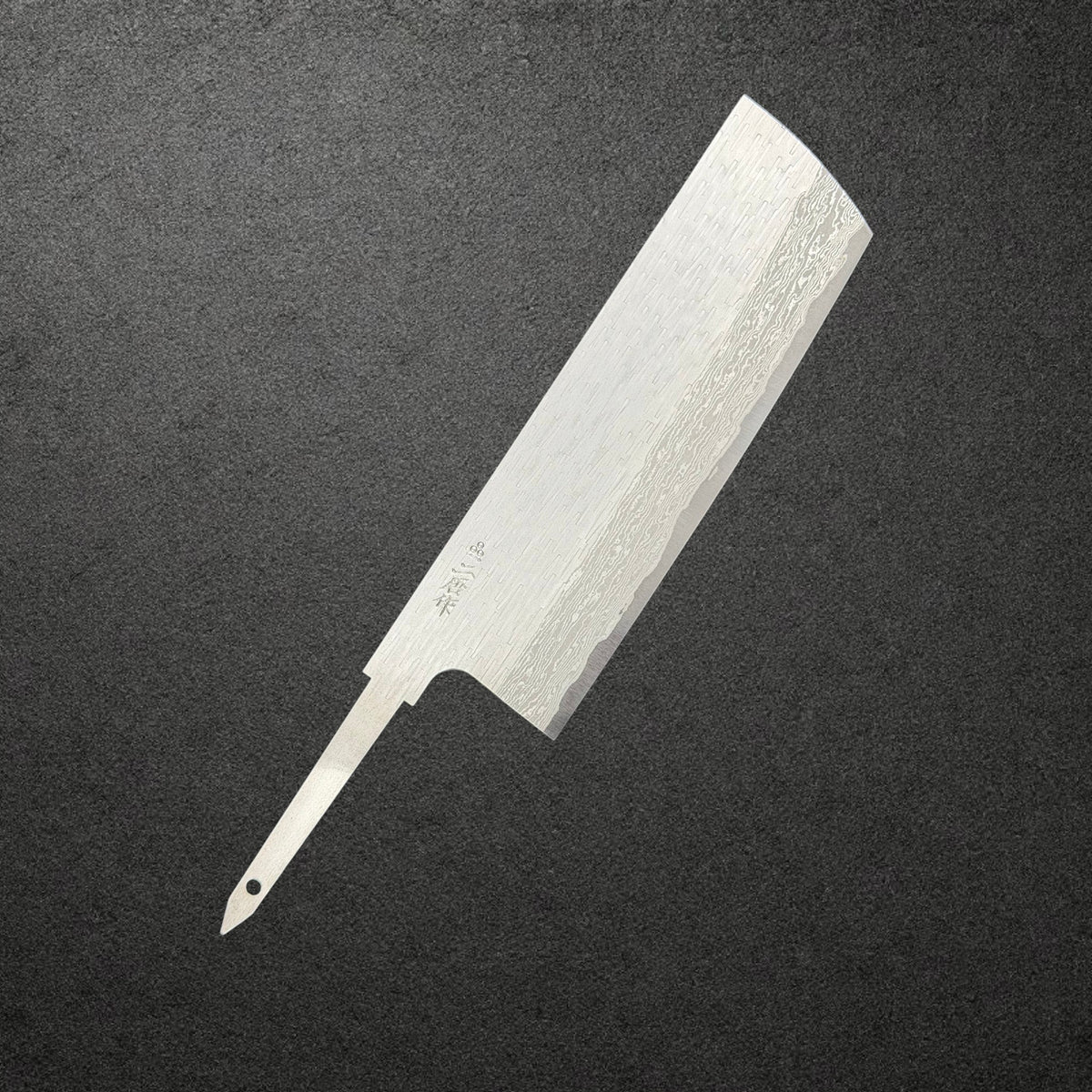 Nigara VG-XEOS Tsuchime Nakiri blade only, angled front view showing Damascus steel and exposed tang