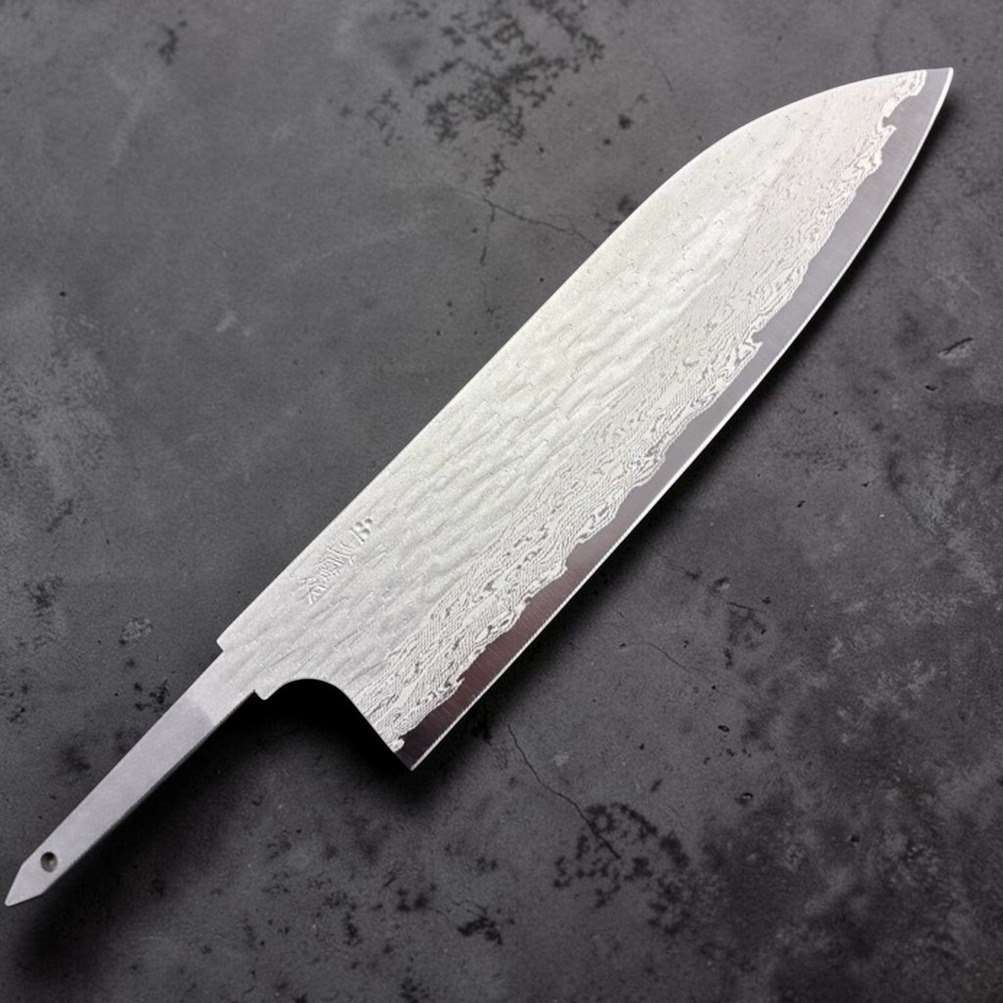 Nigara VG-XOES Damascus Santoku 165 mm blade-only version, close-up of layered Damascus steel pattern.