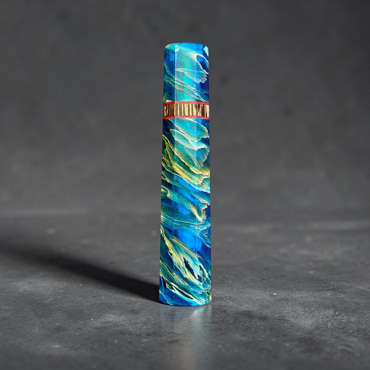 Prisma Knife Gilded Tempest custom wa handle, 135mm, with deep blue resin and sweeping gold accents.