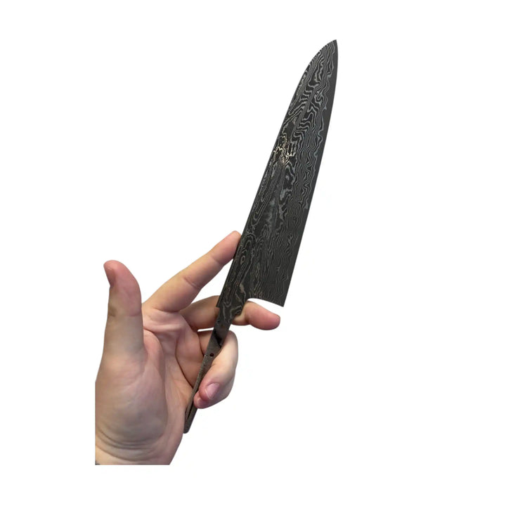 Damascus pattern close-up on SPG STRIX Gyuto blade
