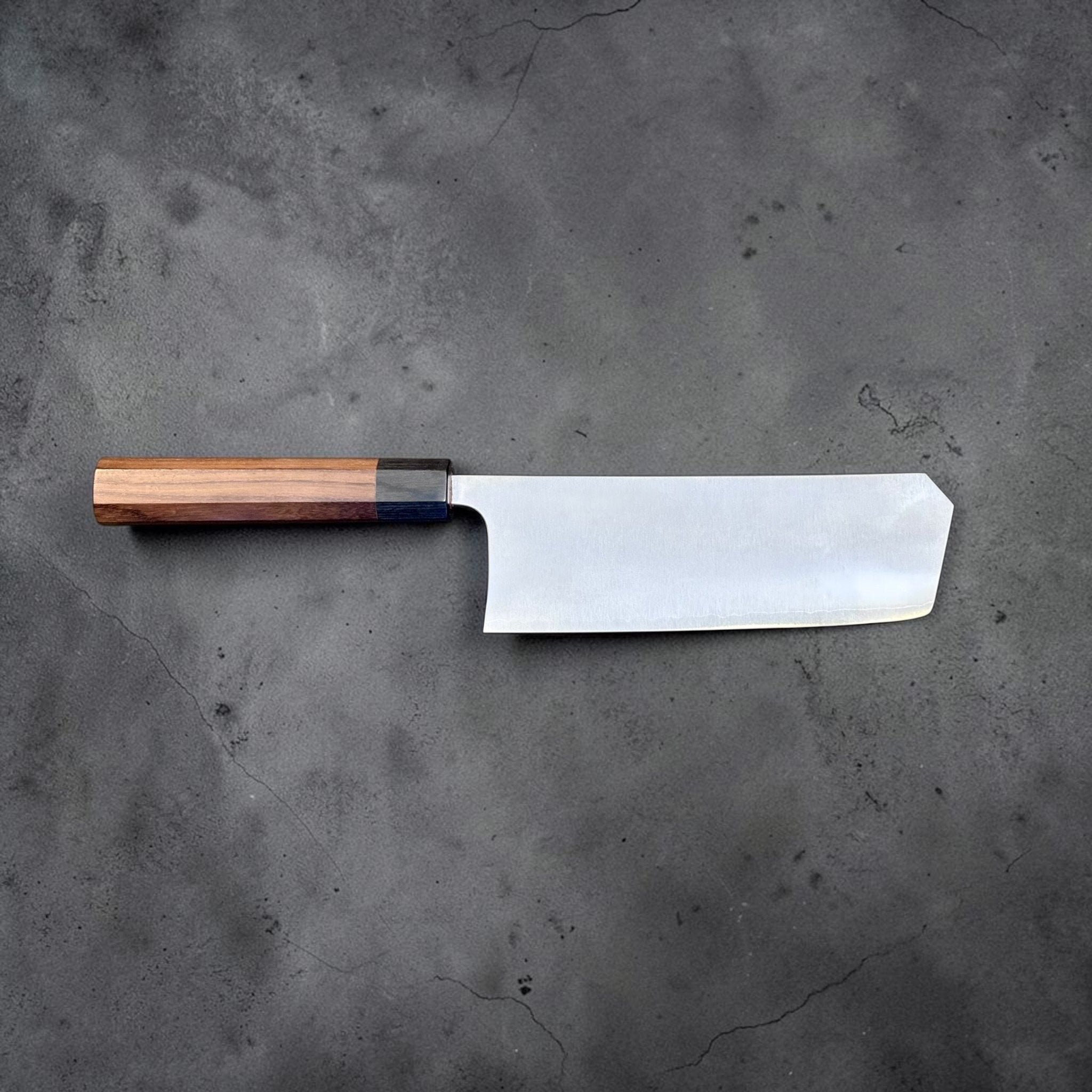 Shibata Koutetsu Chromax Boss Nakiri, full profile view with handle to the left and blade facing right.