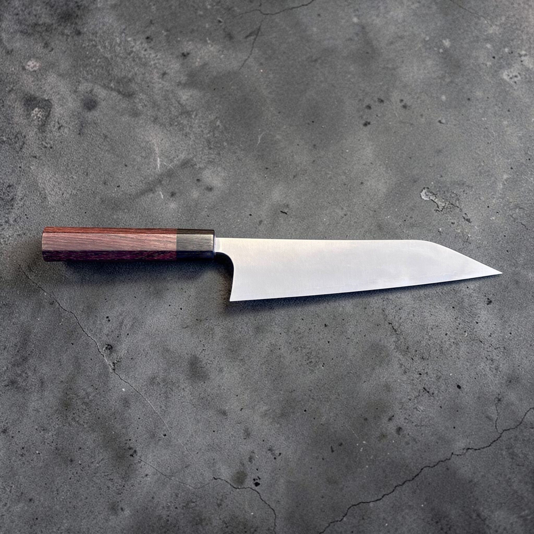 Shibata Koutetsu Chromax Gyuto 210 mm with rosewood octagon handle, full right-facing profile on gray background.