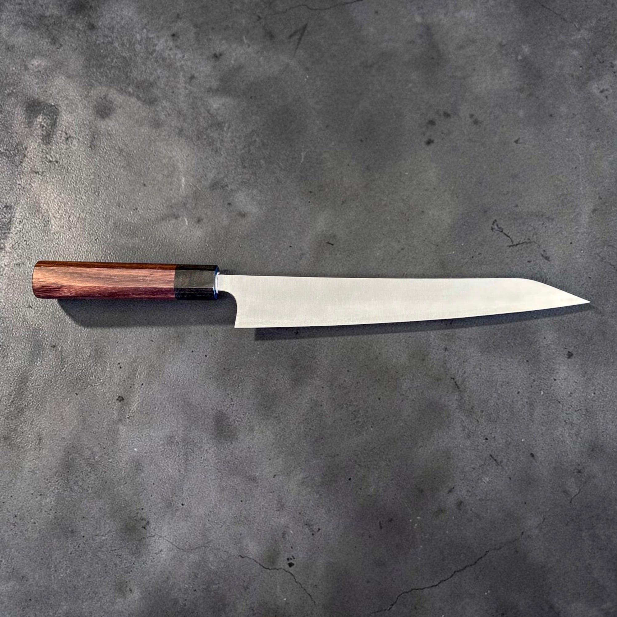 Shibata Koutetsu Chromax Sujihiki 240 mm, full side profile showing long slicing blade and octagonal wa handle.