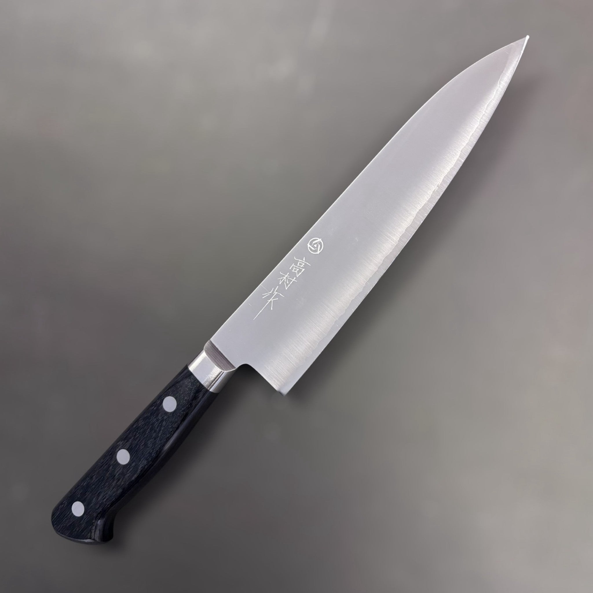 Takamura VG-10 Migaki Gyuto 180 mm, right side profile of polished blade with triple-rivet black Western handle.