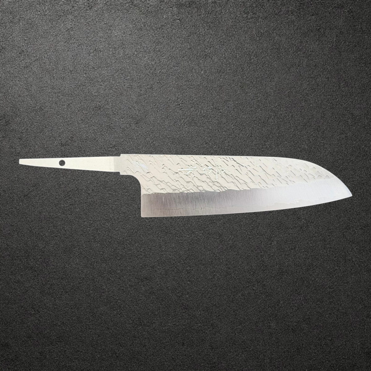 Full front profile of Takeshi Saji STRIX Tsuchime Santoku blade only, showing the rounded santoku tip and cutting edge.