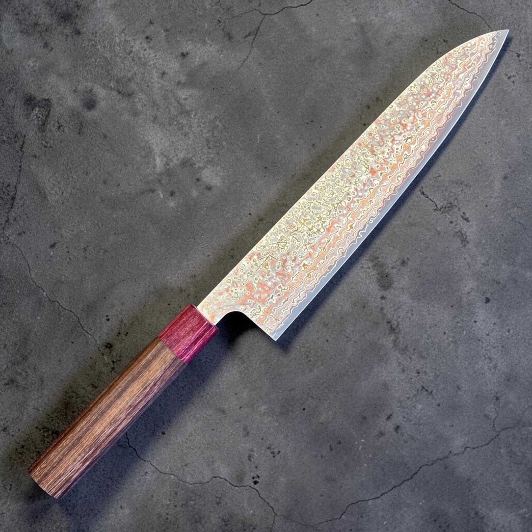 Takeshi Saji VG-10W Nashiji Rainbow Gyuto 240 mm, right side profile of the full knife with rainbow Damascus blade and octagonal wood handle.