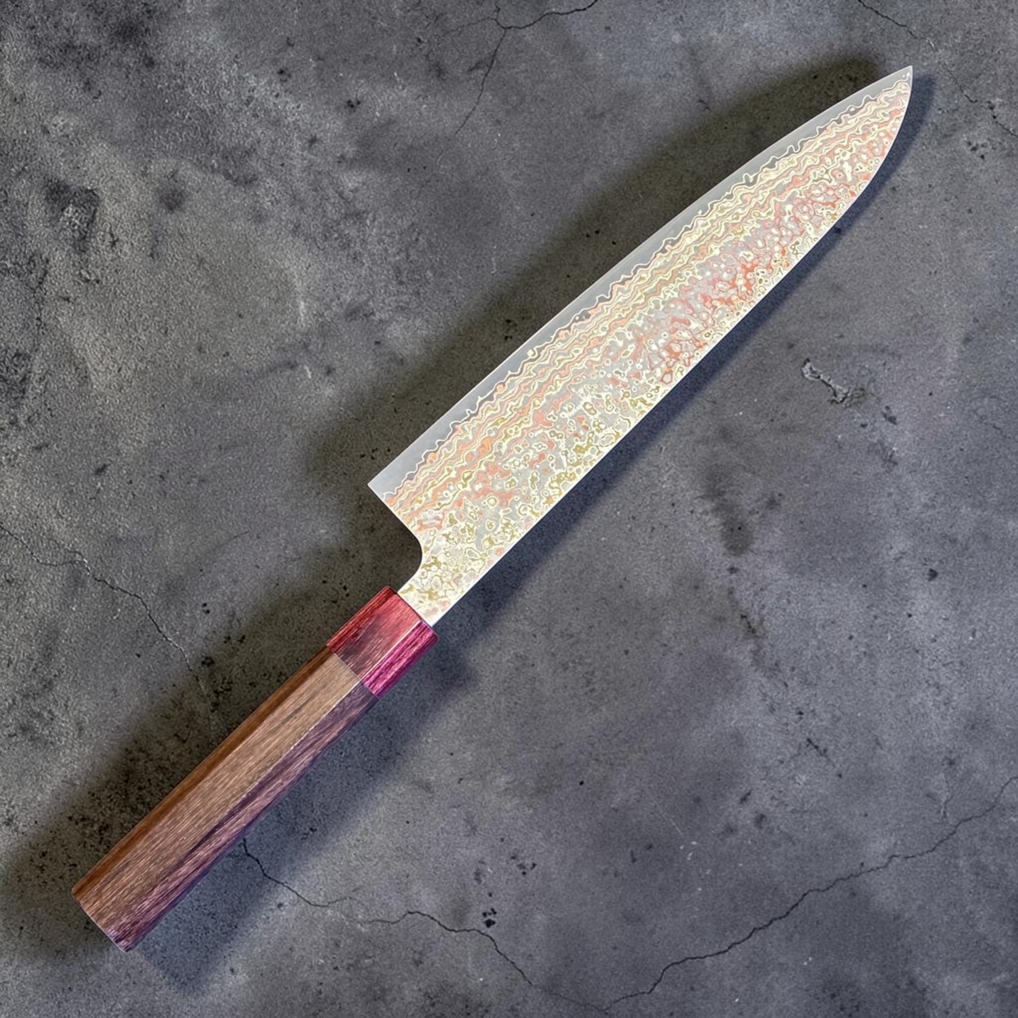 Takeshi Saji VG-10W Nashiji Rainbow Gyuto 240 mm, left side profile of the full knife with rainbow Damascus blade and octagonal wood handle.