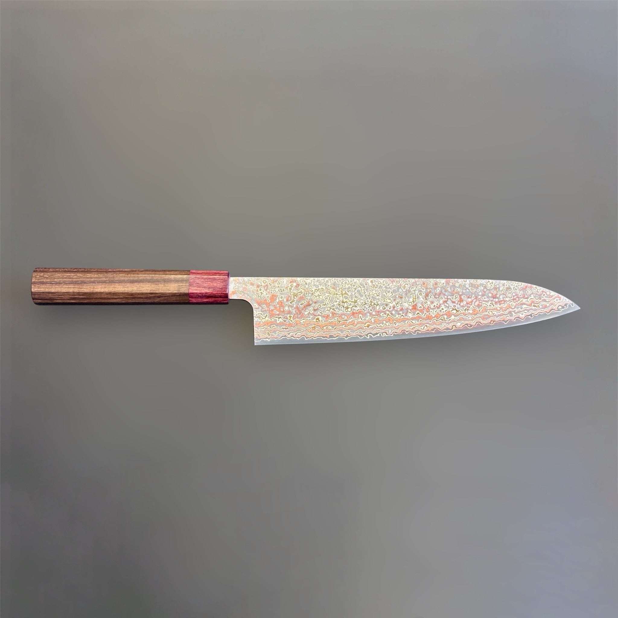 Takeshi Saji VG-10W Nashiji Rainbow Gyuto 240 mm, side profile of the full knife with rainbow Damascus blade and octagonal wood handle.