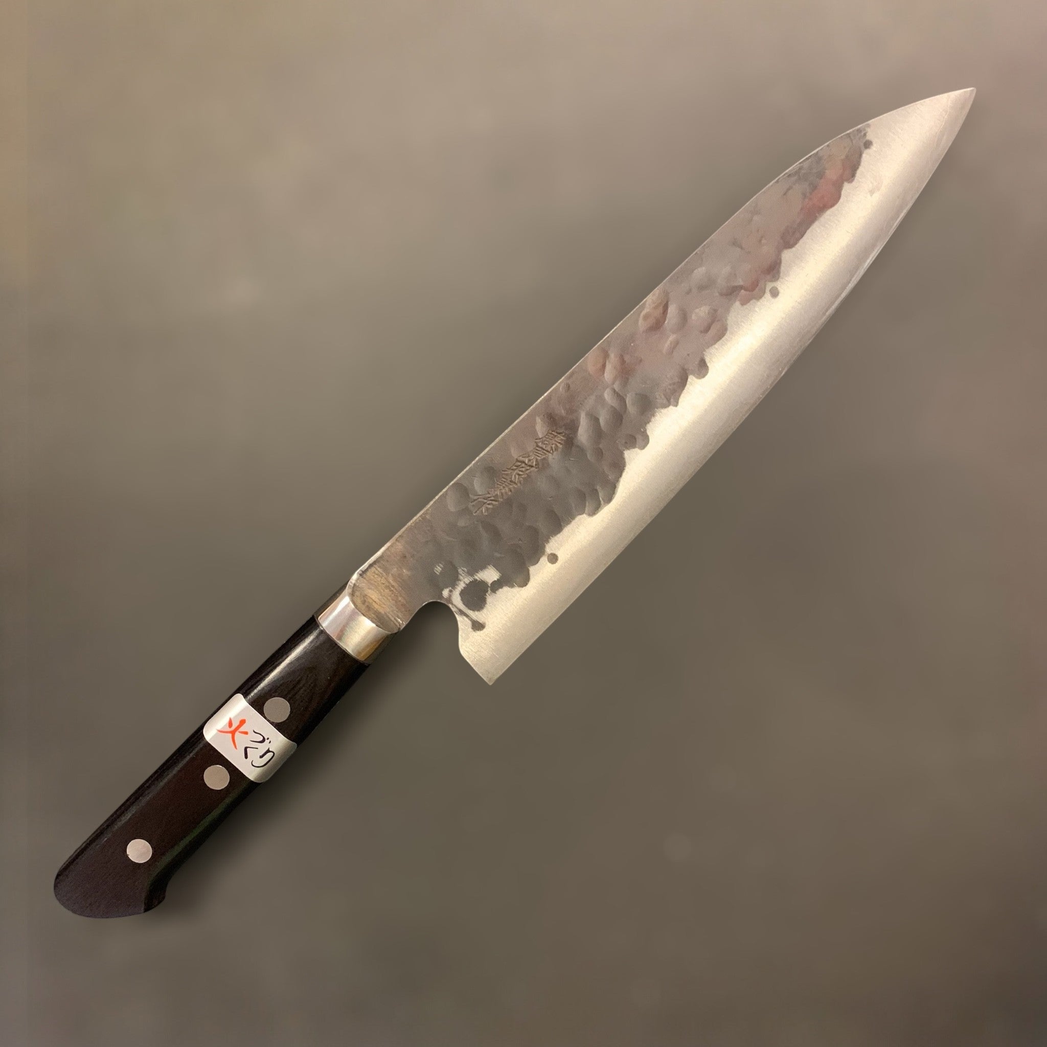 Teruyasu Fujiwara Denka Aogami Super Gyuto 195mm, full right-side view showing hammered kurouchi cladding and Western handle.