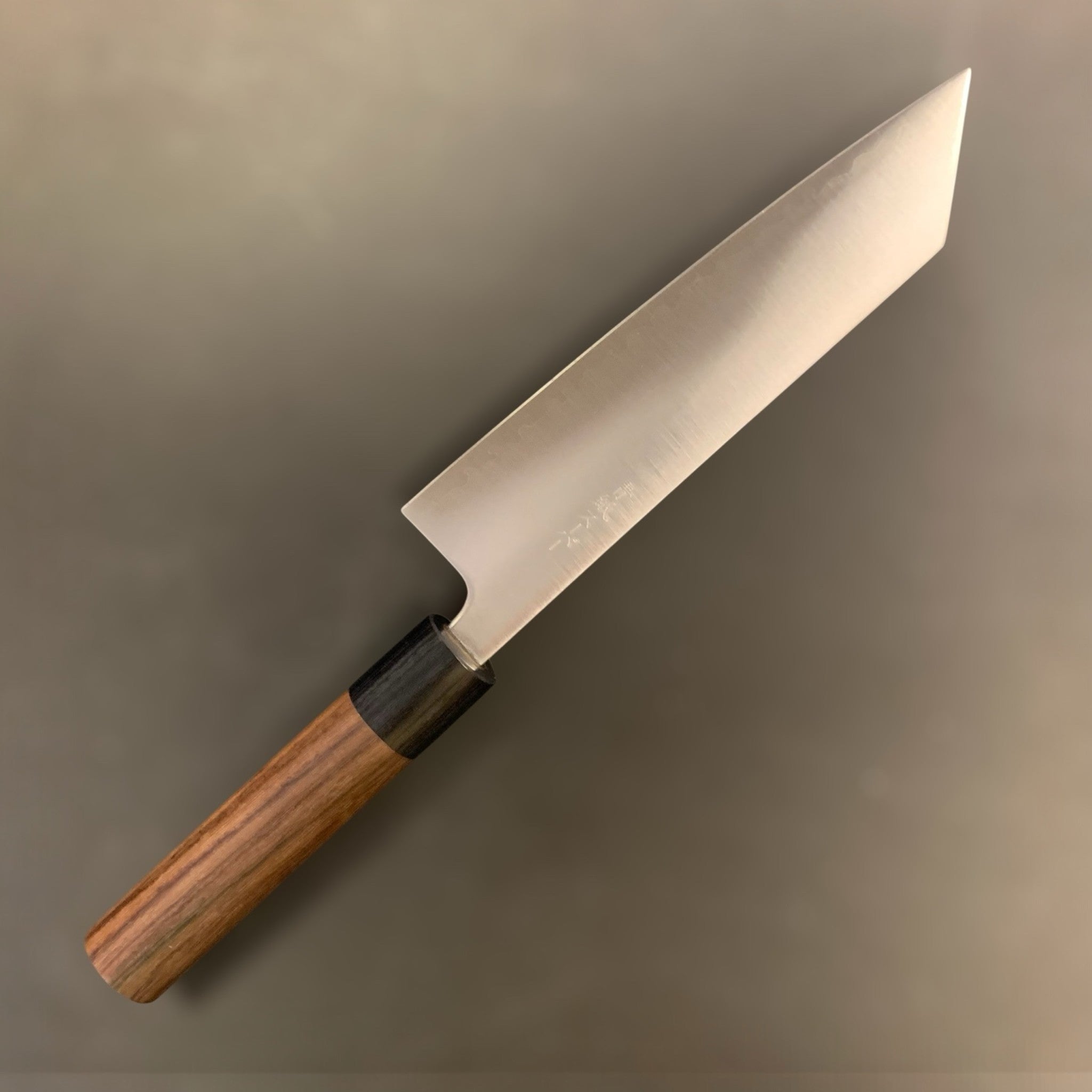 Tokushu Aogami Super Migaki Bunka, versatile Japanese kitchen knife with brushed migaki finish and wa handle. Left side. 