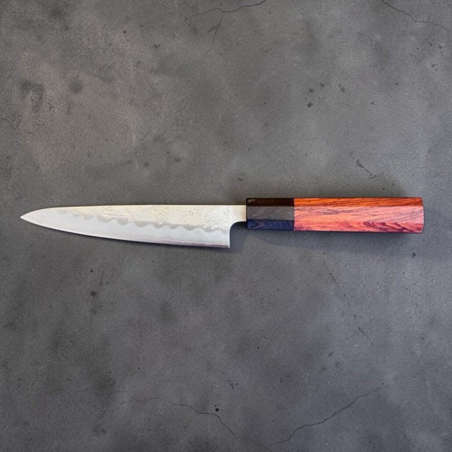Tokushu Ginsan #3 Nashiji Petty 135mm with rosewood and ebony octagonal handle, full reverse-side profile.