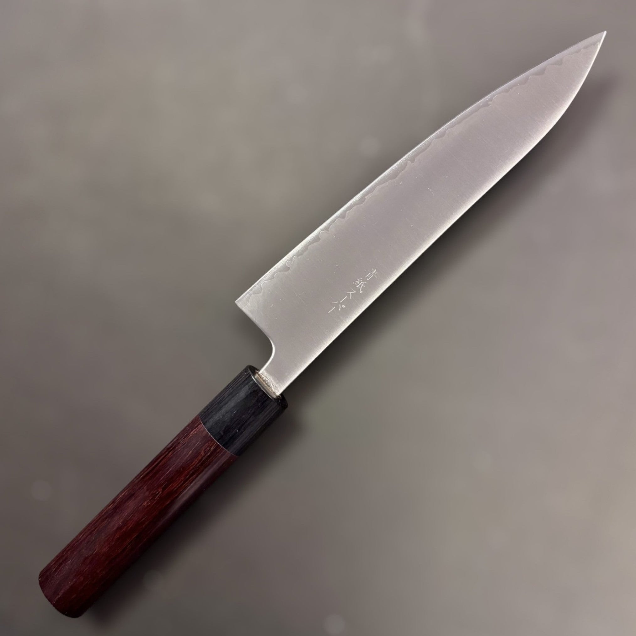 Tokushu Knife Aogami Super Migaki Gyuto 180 mm, left blade face with kanji stamp and rosewood wa handle.