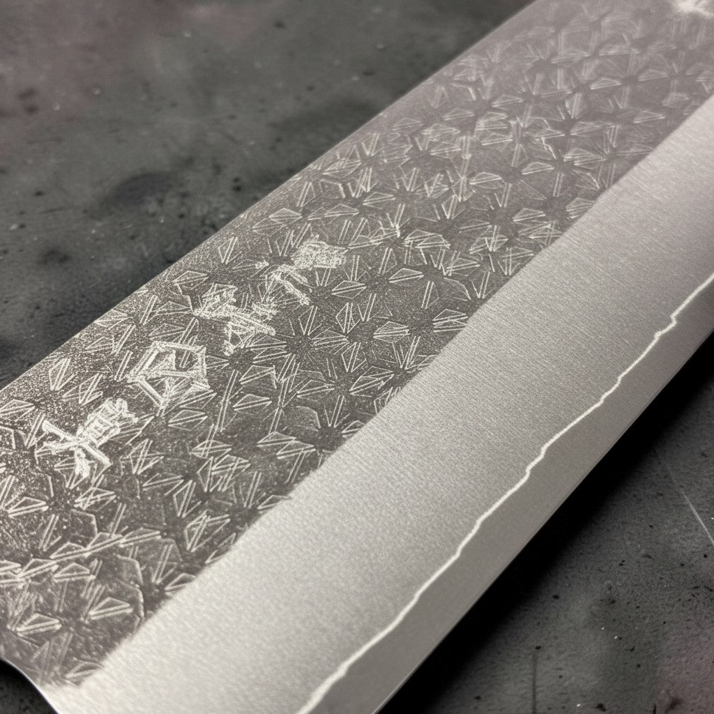 Tokushu Knife Makoto Kurosaki VG-XEOS Tsuchime Bunka 240mm blade with hammered finish and Japanese characters.