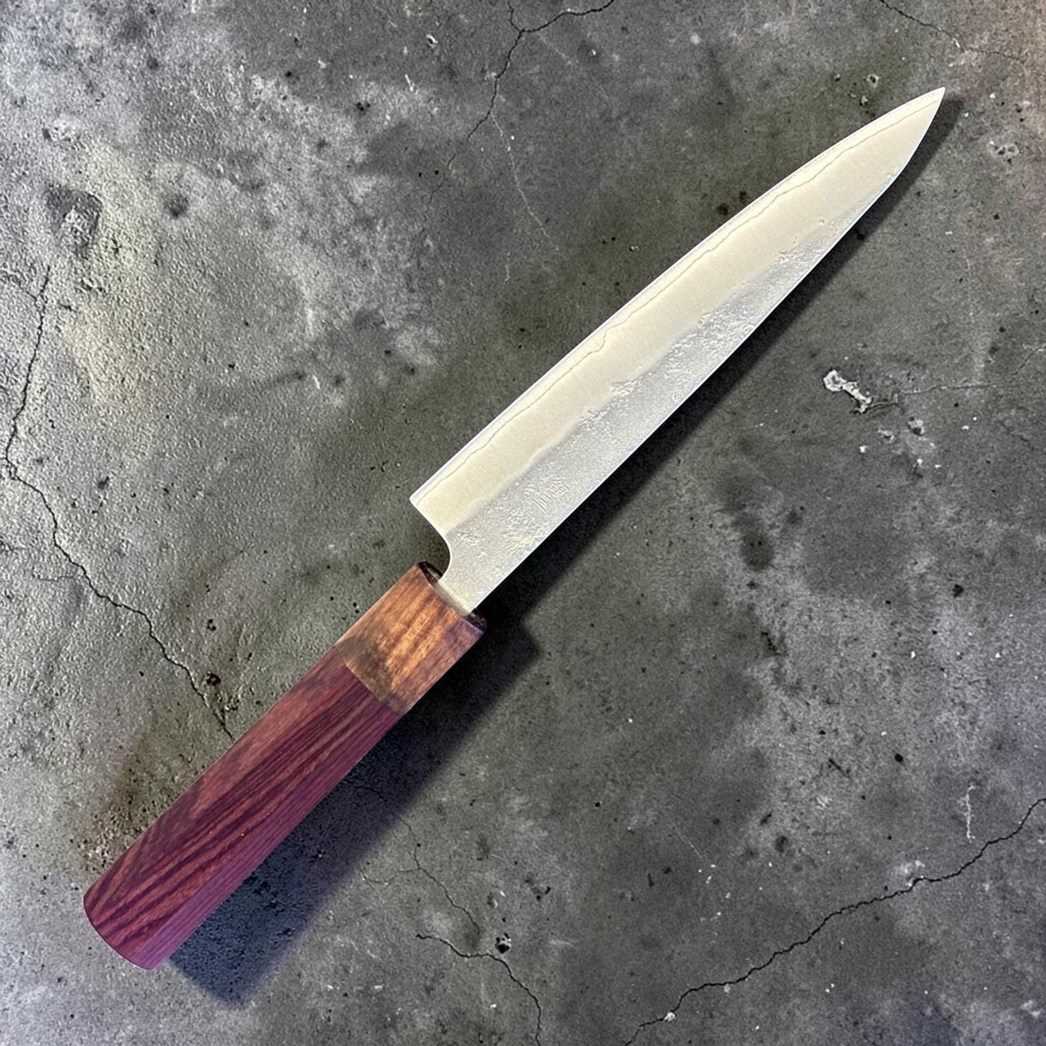 Tokushu Knife Nashiji Ginsan #3 Petty 150 mm with rosewood wa handle, angled full-profile product photo showing the nashiji blade finish and rosewood wa handle.