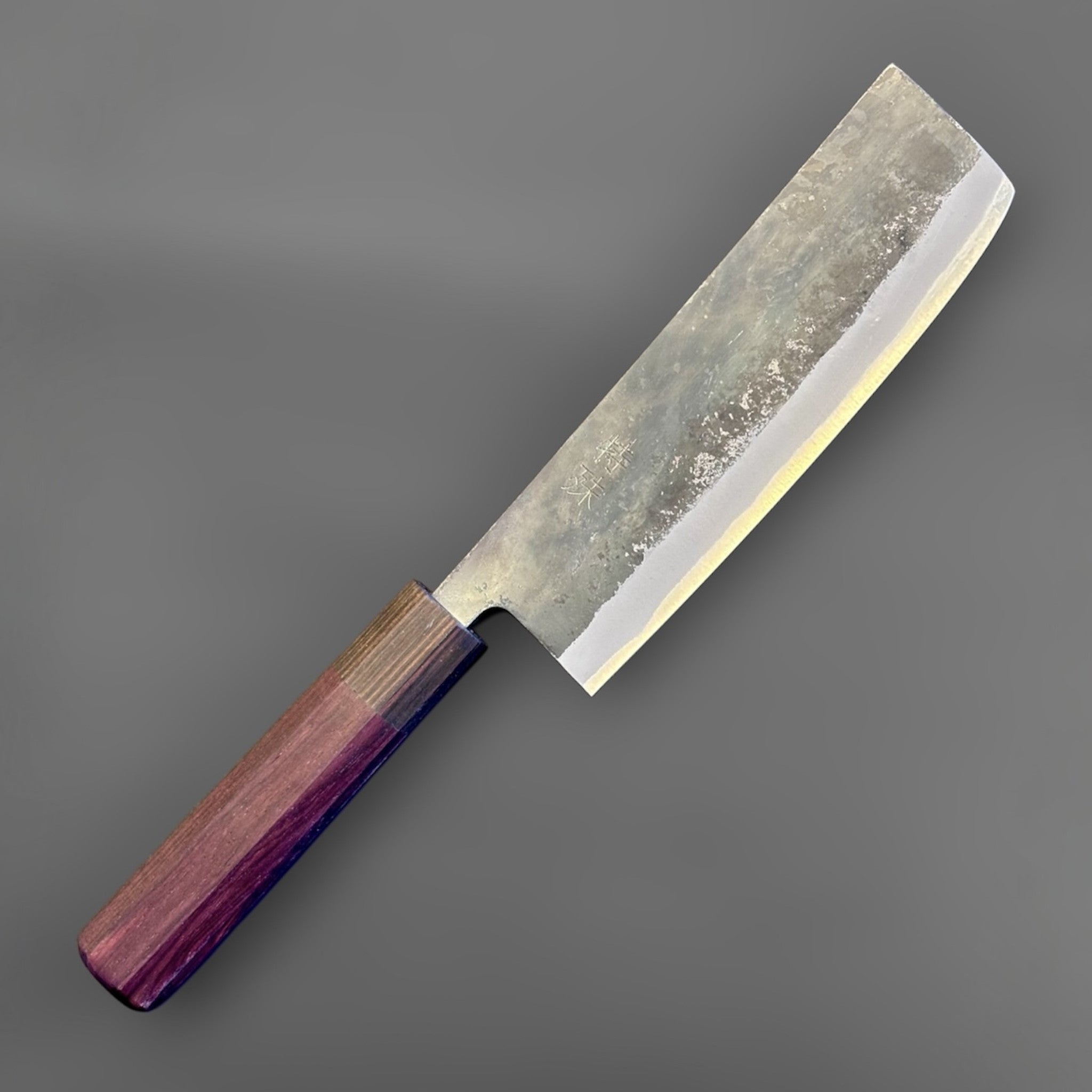 Tokushu Knife Rosewood Series White #2 Kurouchi 165 mm Japanese nakiri knife, angled front view showing kurouchi finish and rosewood wa handle.