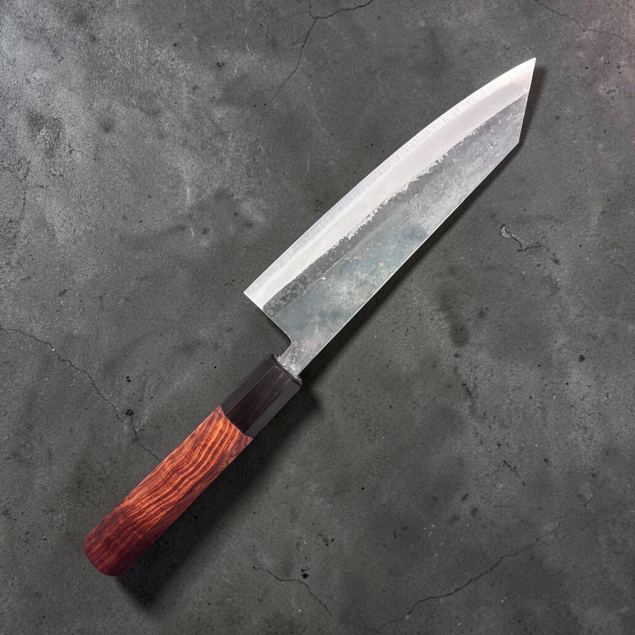 Tokushu Knife Rosewood Series White #2 Bunka 165mm, left side close-up showing rustic cladding, tapered spine, and octagonal rosewood handle.