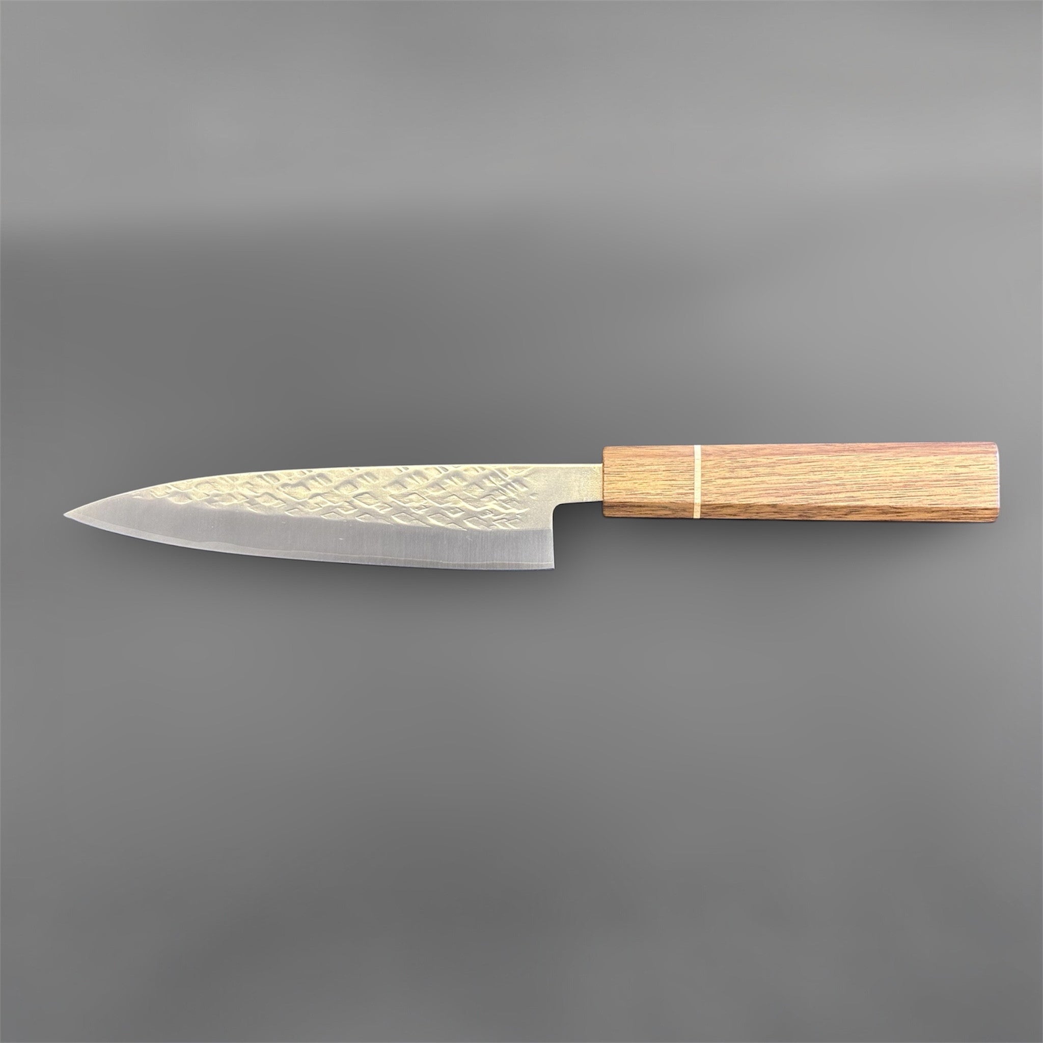 Tokushu Knife Tsuchime SLD 165 mm Hiraki Petty, reverse full profile view showing the slender petty profile and warm wood handle.