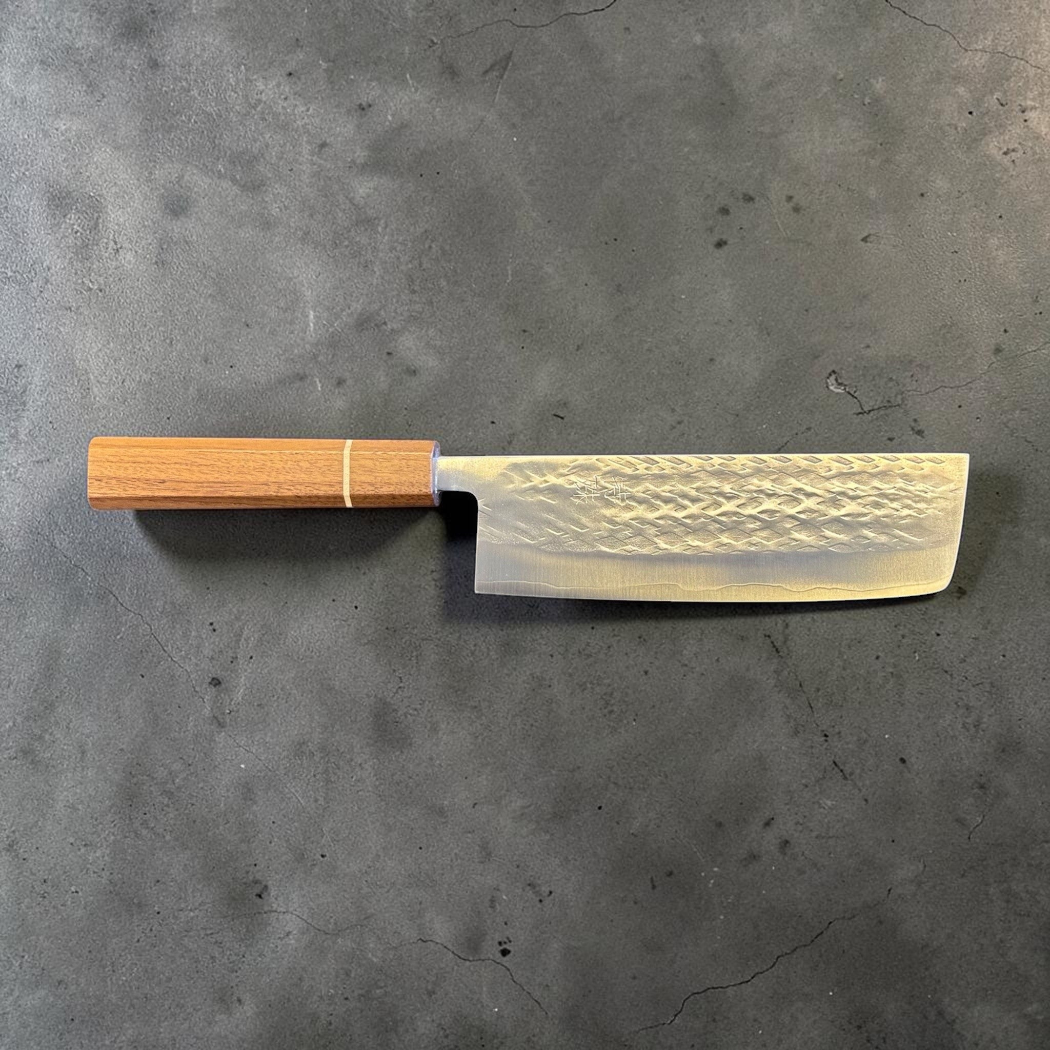 Tokushu Knife Tsuchime SLD Nakiri, full profile view showing the tall blade shape, hammered finish, and wooden wa handle.
