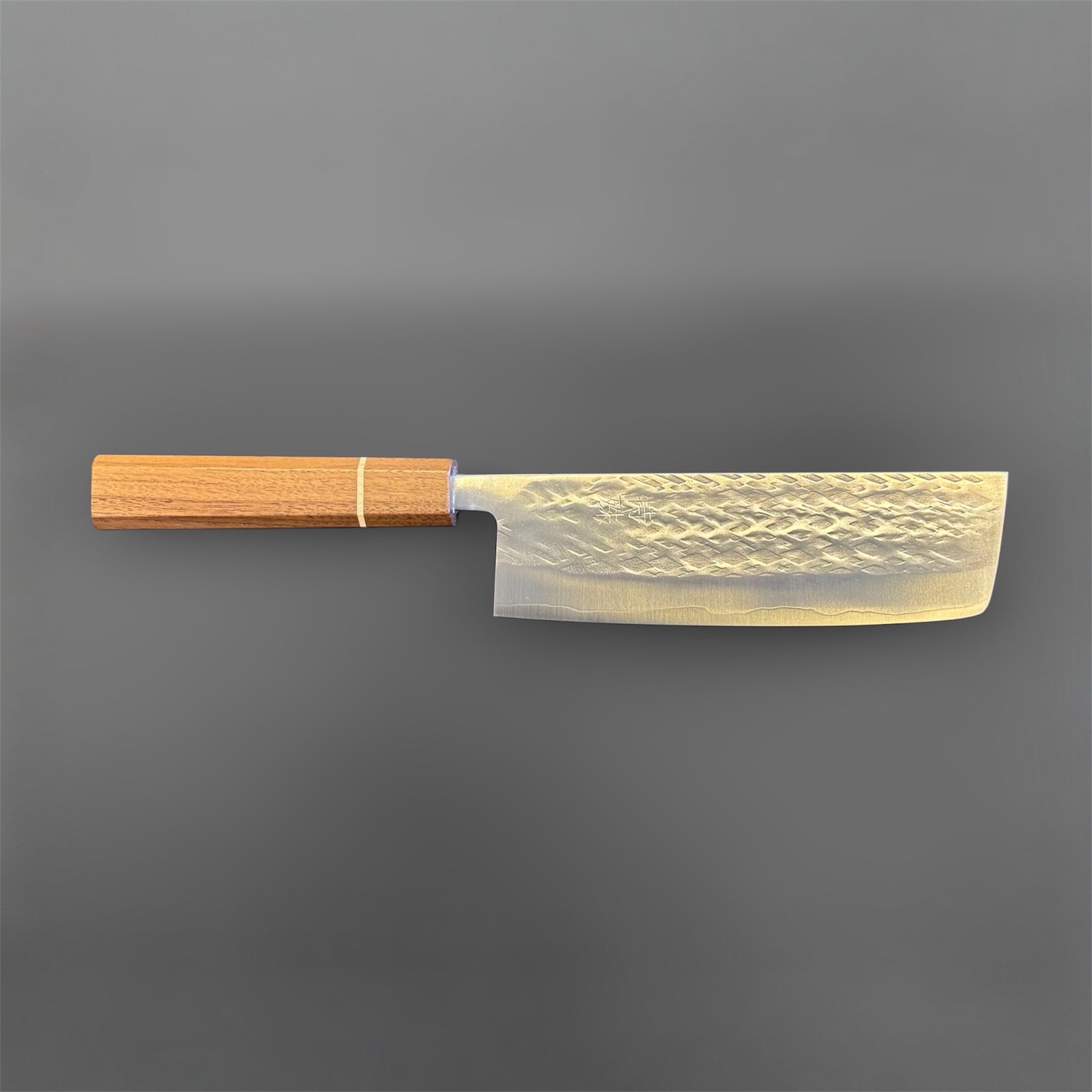 Tokushu Knife Tsuchime SLD Nakiri, full profile view showing the tall blade shape, hammered finish, and wooden wa handle.