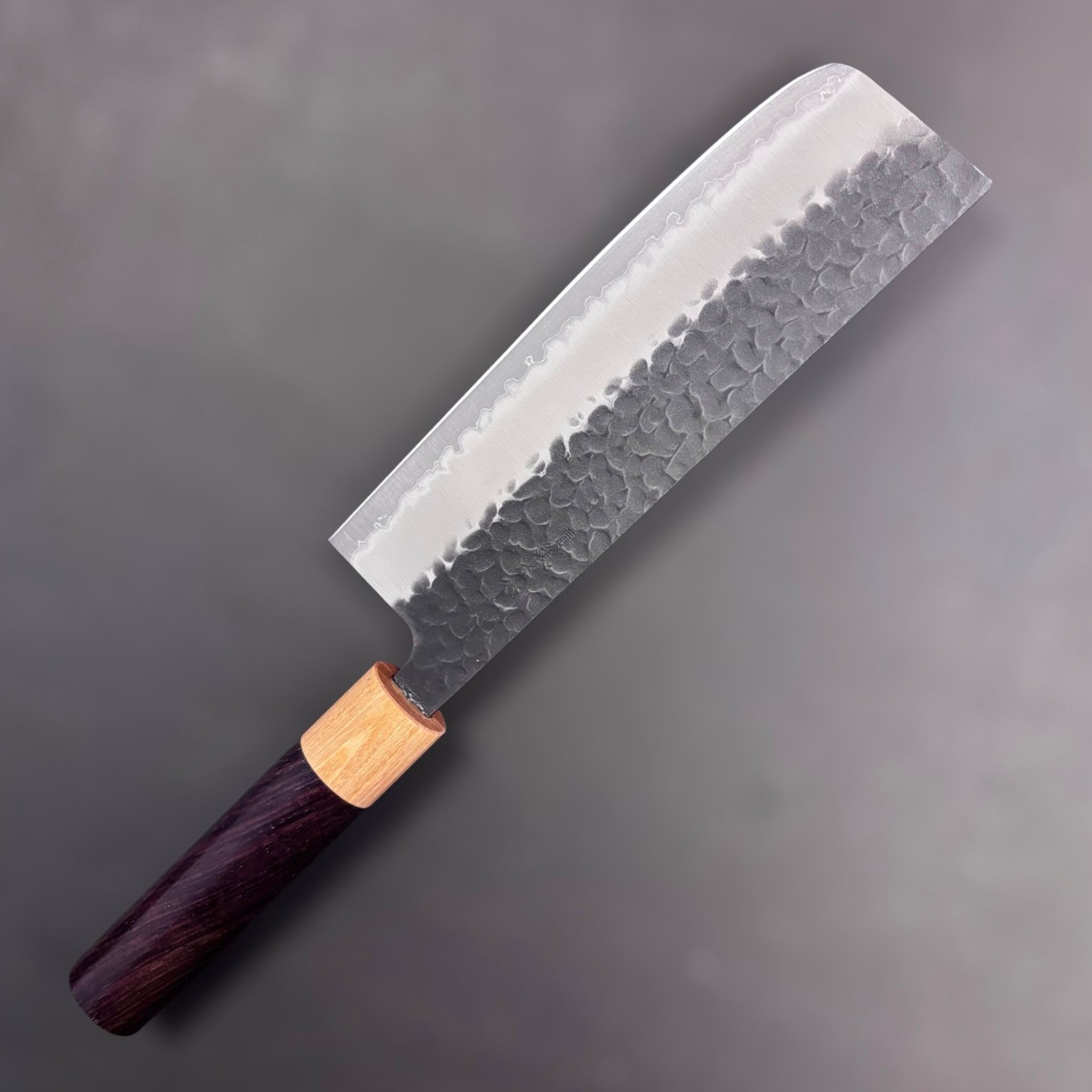 Tsunehisa Aogami Super Kurouchi Tsuchime Nakiri 165 mm, left-side face showing hammered kurouchi cladding and straight nakiri edge profile.