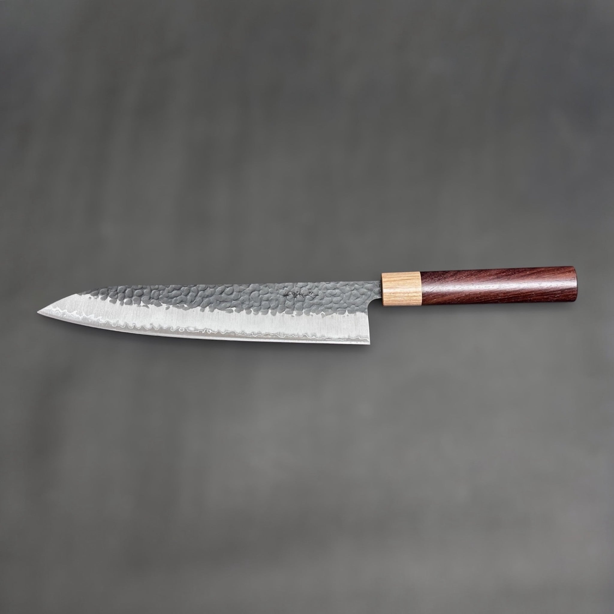 Tsunehisa Aogami Super Kurouchi Tsuchime Gyuto 240 mm Japanese chef knife profile shot. 