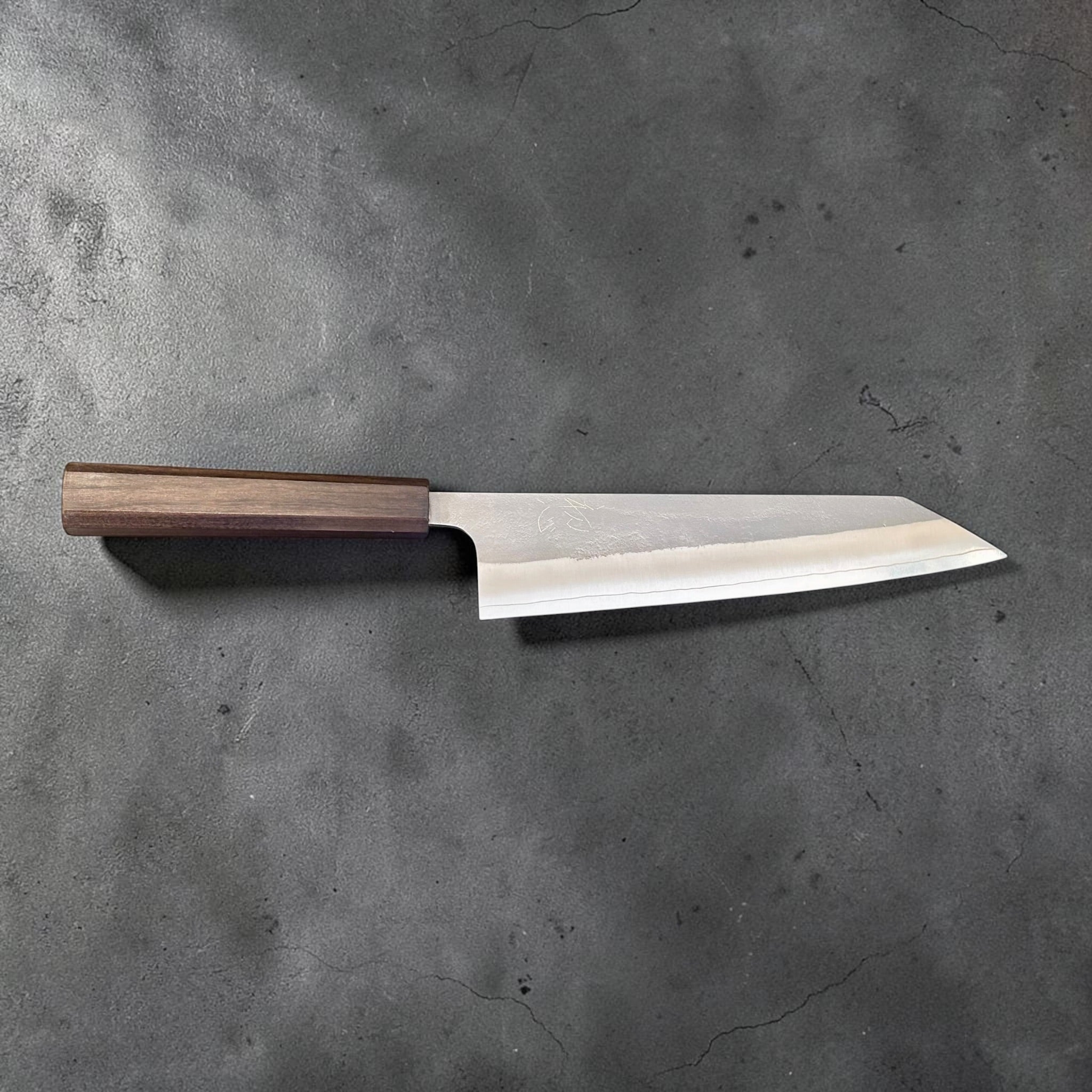 Yoshikane SKD Nashiji Kiritsuke 210mm with mono bubinga handle, full maker-side profile.