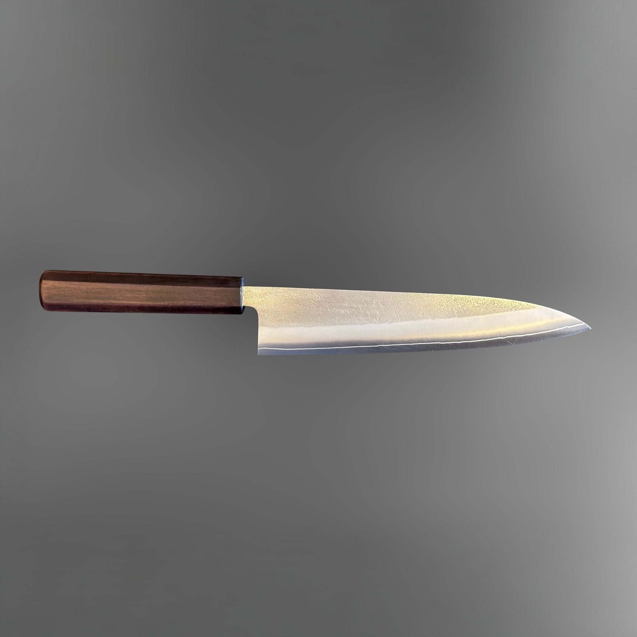 Yoshikane SKD Nashiji Gyuto 210 mm with mono ebony handle, full side profile of blade and handle.
