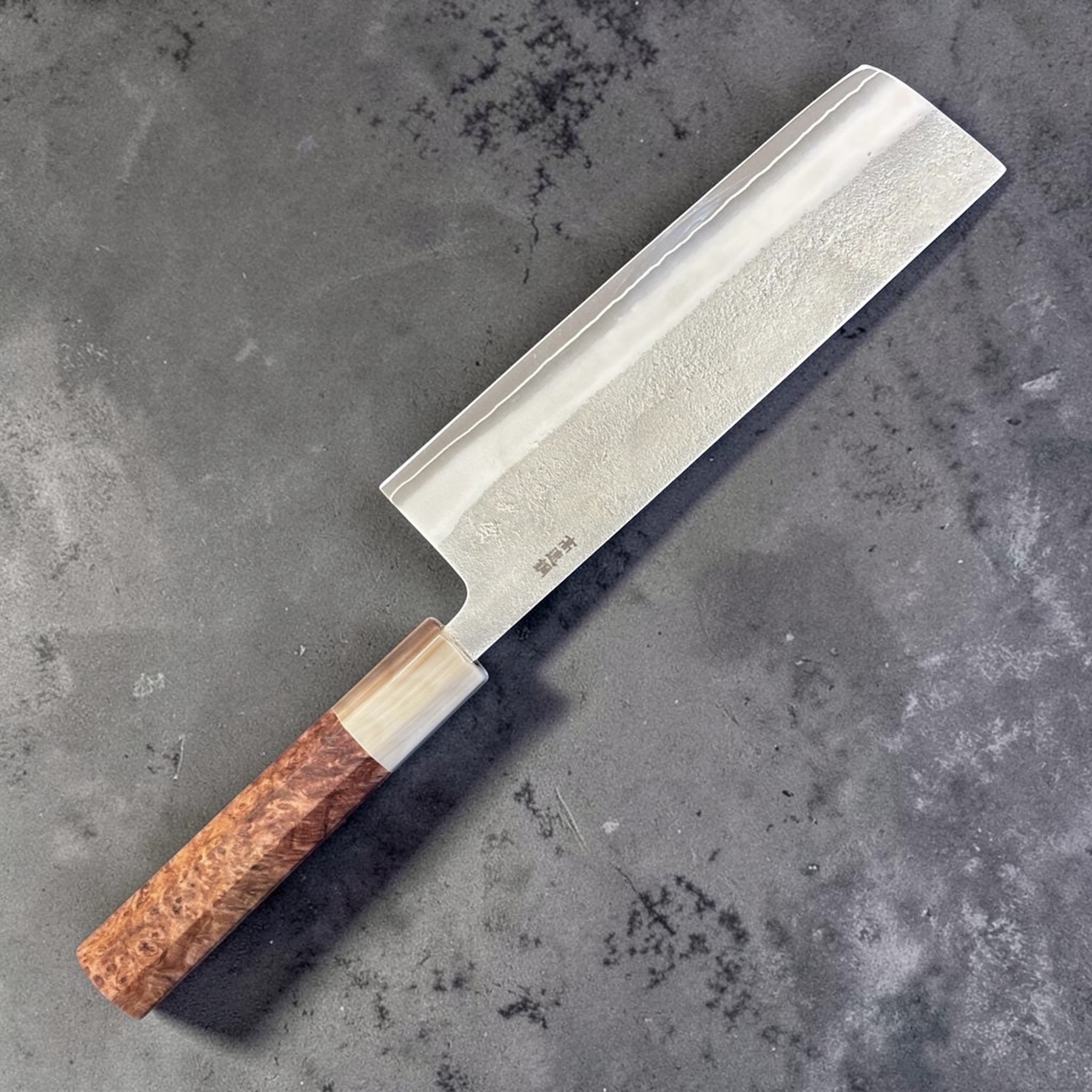 Yoshikane SKD Nashiji Nakiri with amboyna burl handle, alternate angled view showing Nashiji finish.